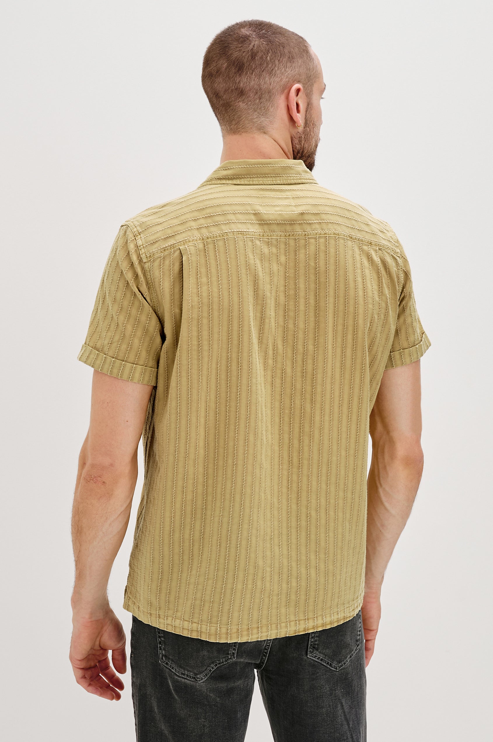 Sinclair Short Sleeve Button Up with Textured Vertical Stripes and a Camp Collar in Jute Colorway - Back View Featured on Model