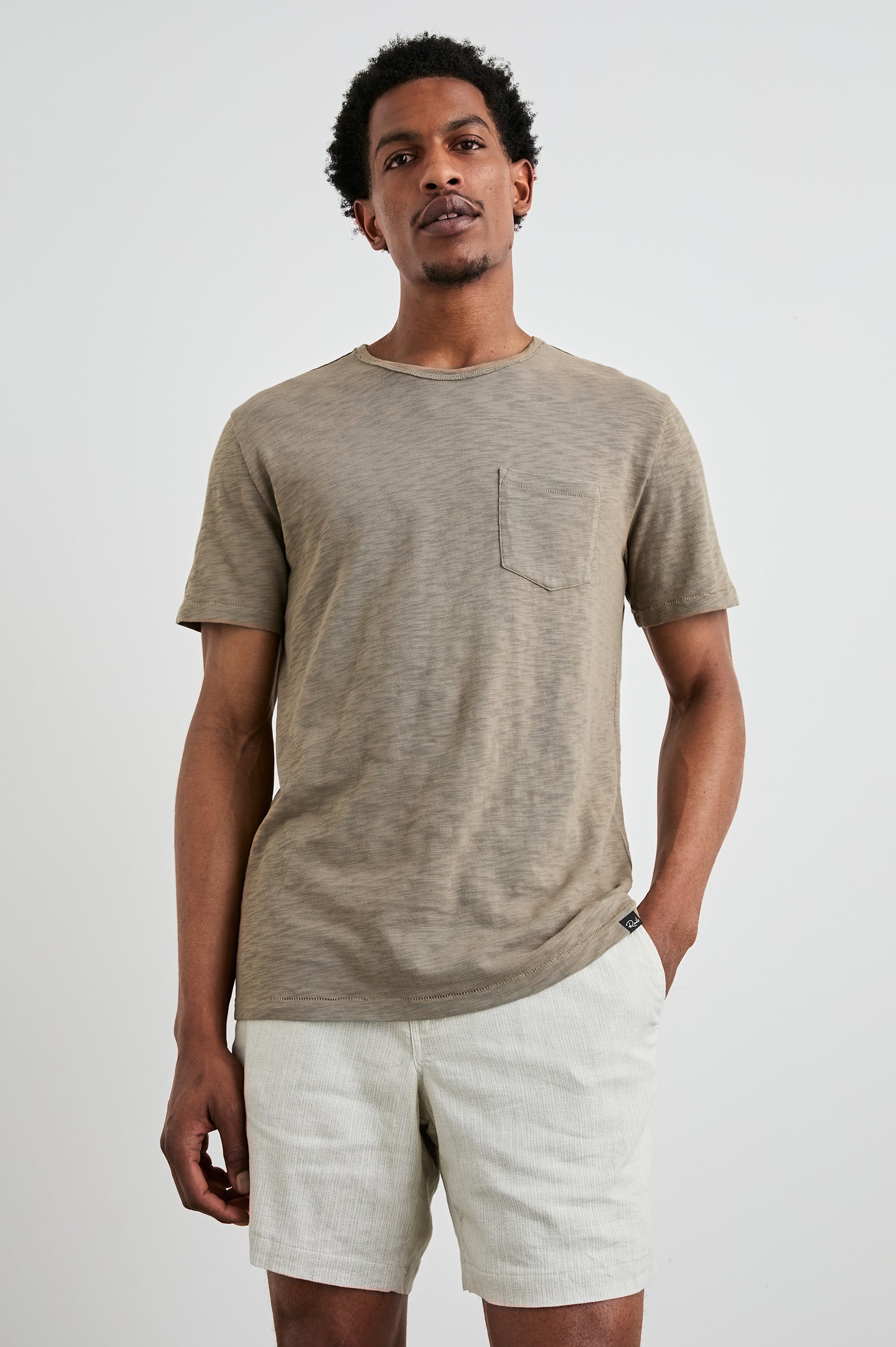 Skipper Short-Sleeve T-shirt with a Crew Neck and a Chest Patch Pocket in Barley Colorway - Front View Featured on Model