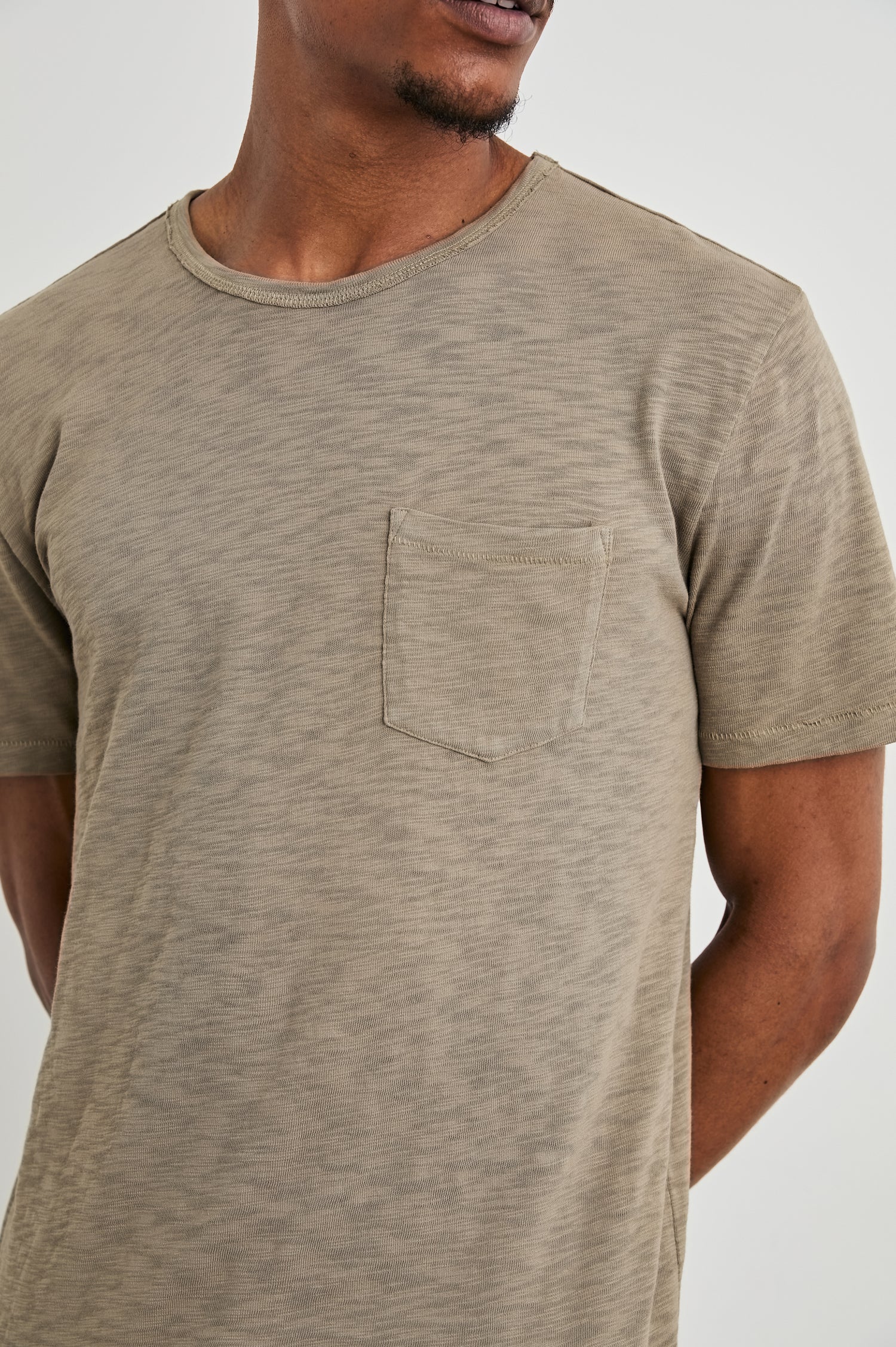 Skipper Short-Sleeve T-shirt with a Crew Neck and a Chest Patch Pocket in Barley Colorway - Front View Featured on Model