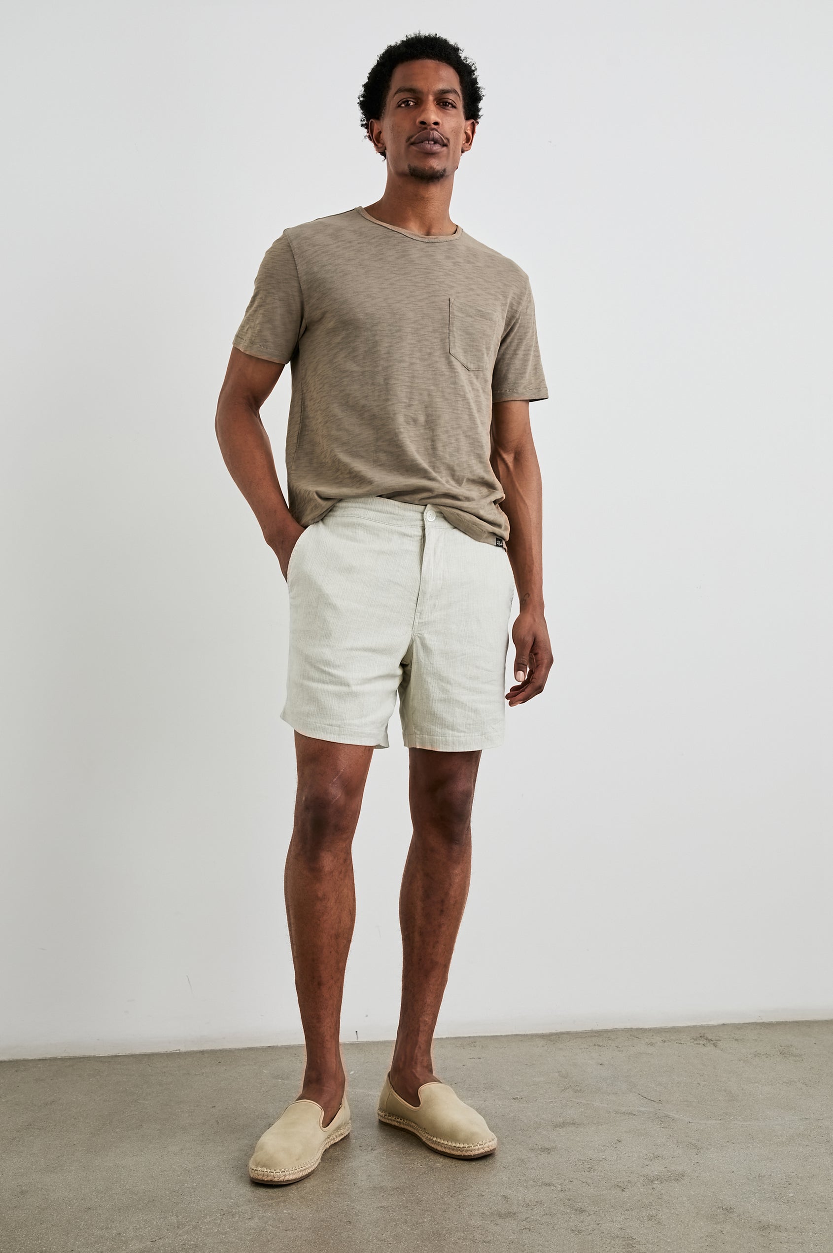 Skipper Short-Sleeve T-shirt with a Crew Neck and a Chest Patch Pocket in Barley Colorway - Front Full Body View Featured on Model