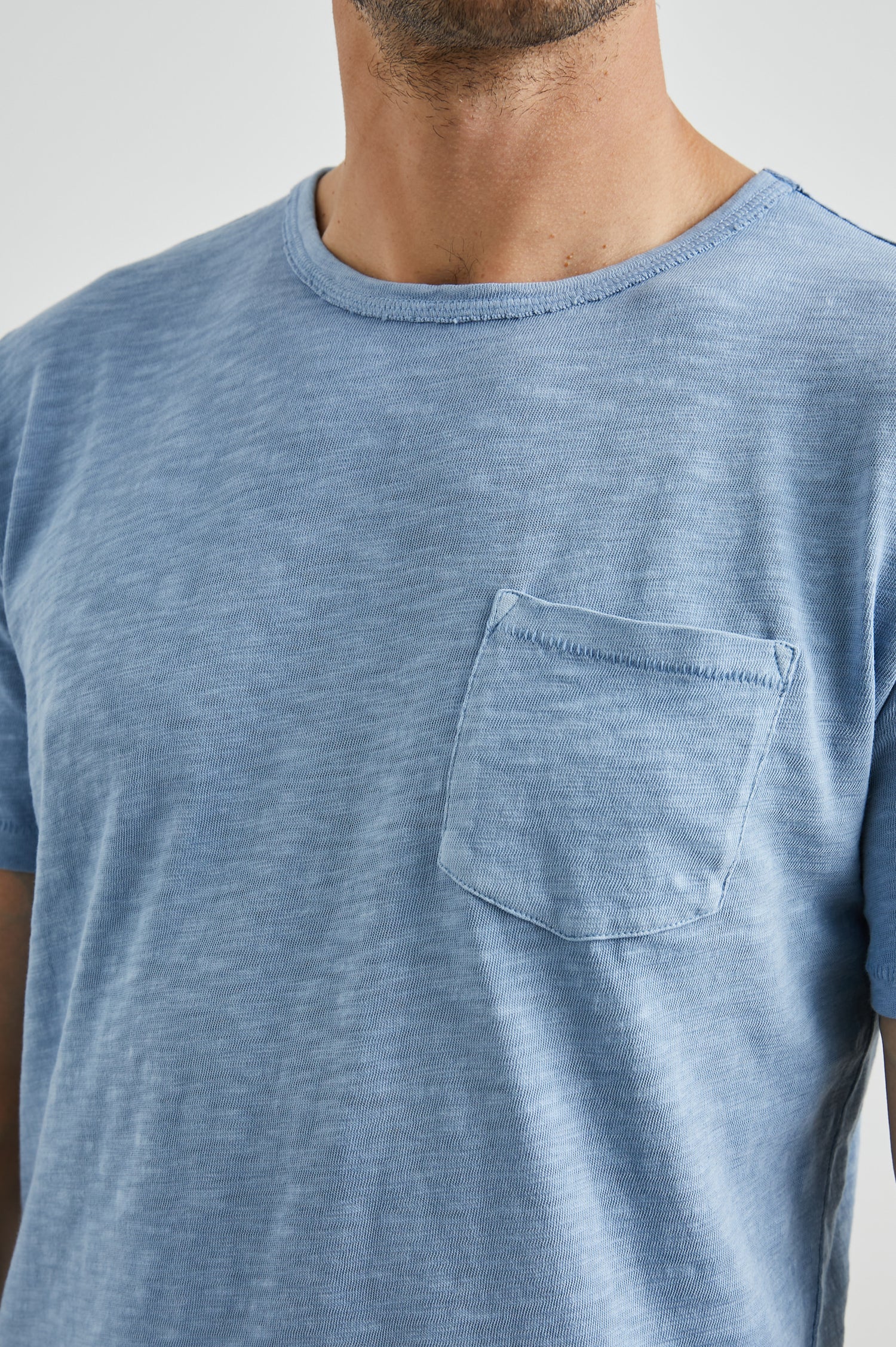 Skipper Short-Sleeve T-shirt with a Crew Neck and a Chest Patch Pocket in Celsius Colorway, a Blue - Front View Featured on Model