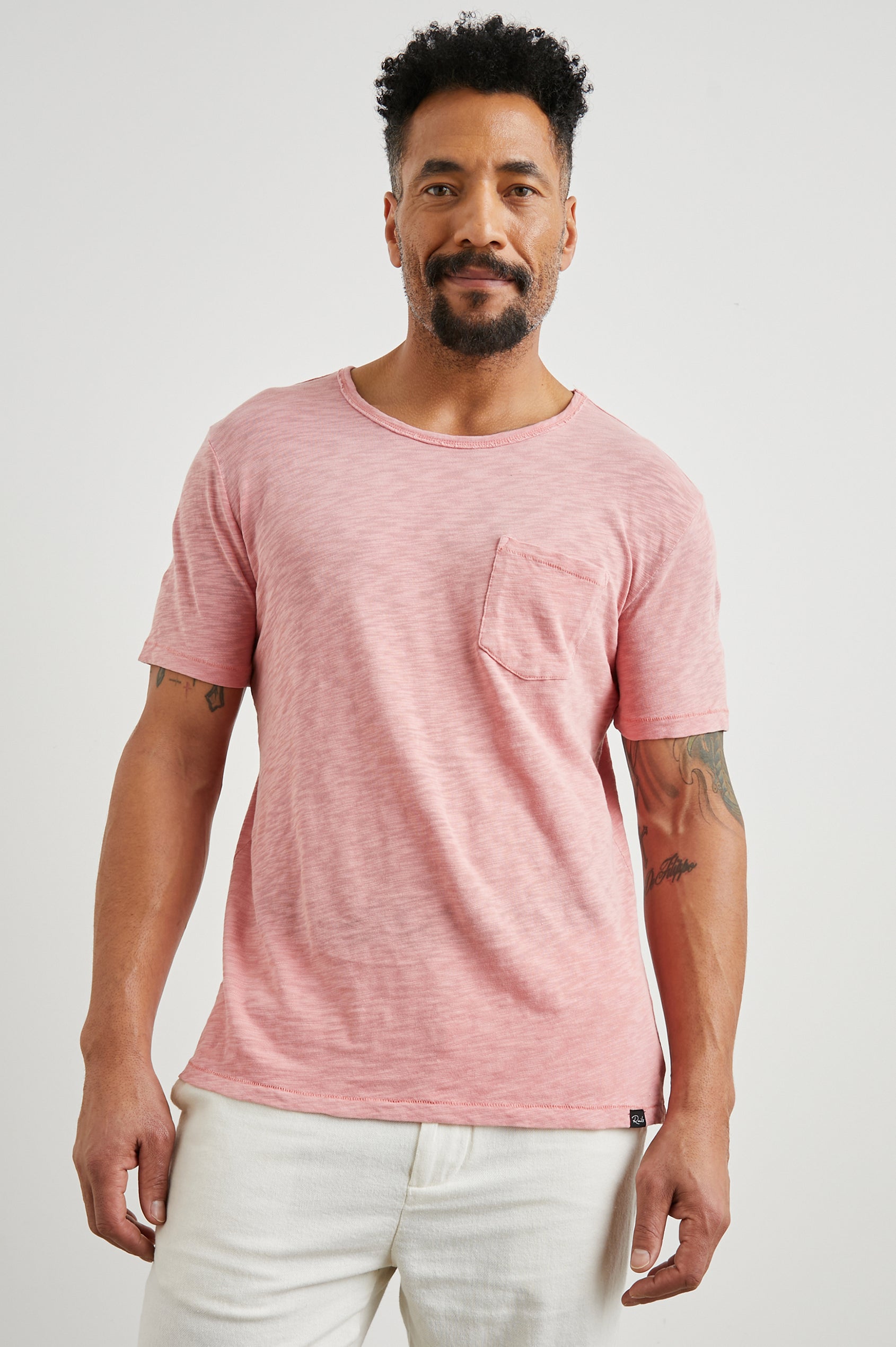 Skipper Short-Sleeve T-shirt with a Crew Neck and a Chest Patch Pocket in Equator Colorway, a Pink - Front View Featured on Model