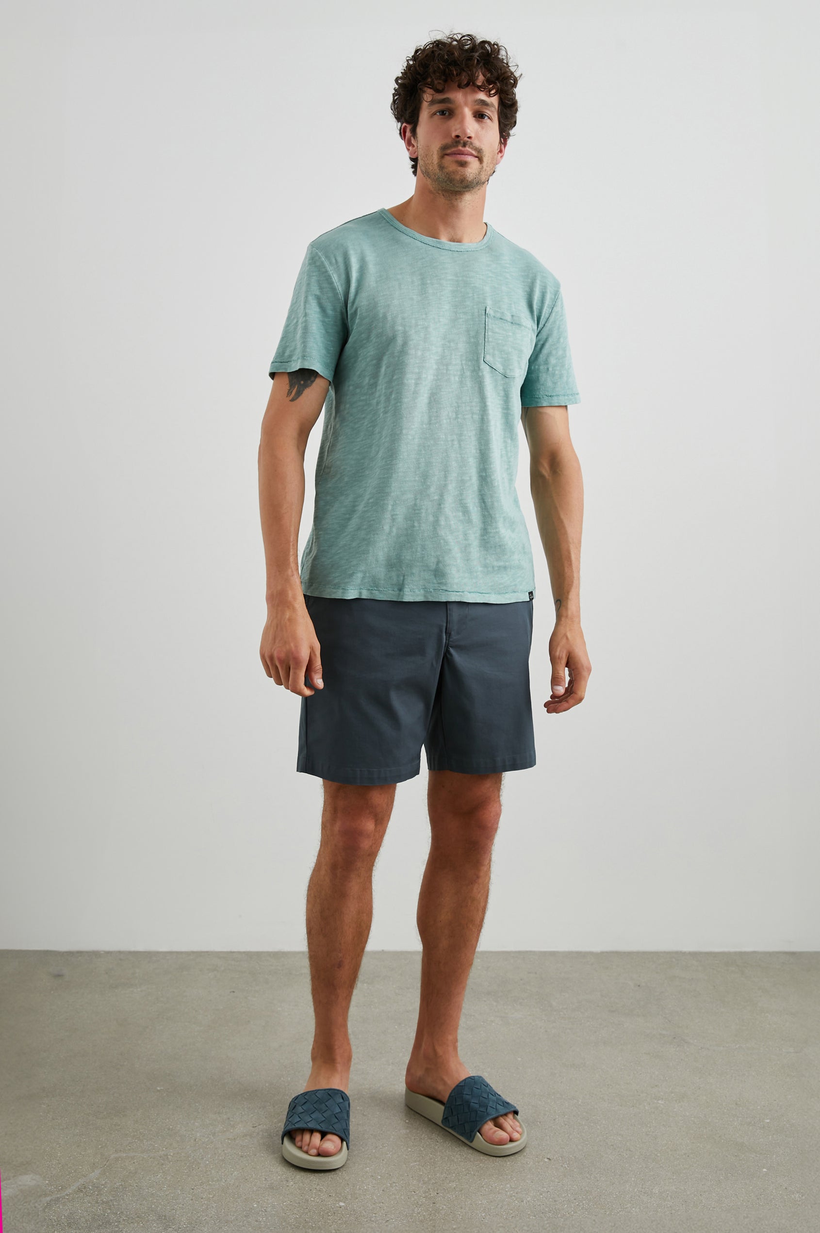 Skipper Short-Sleeve T-shirt with a Crew Neck and a Chest Patch Pocket in Jade Colorway - Front Full Body View Featured on Model
