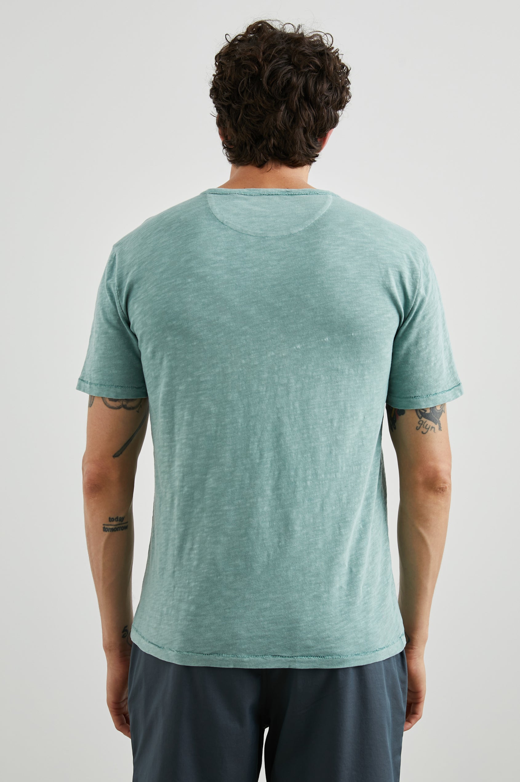 Skipper Short-Sleeve T-shirt with a Crew Neck and a Chest Patch Pocket in Jade Colorway - Back View Featured on Model