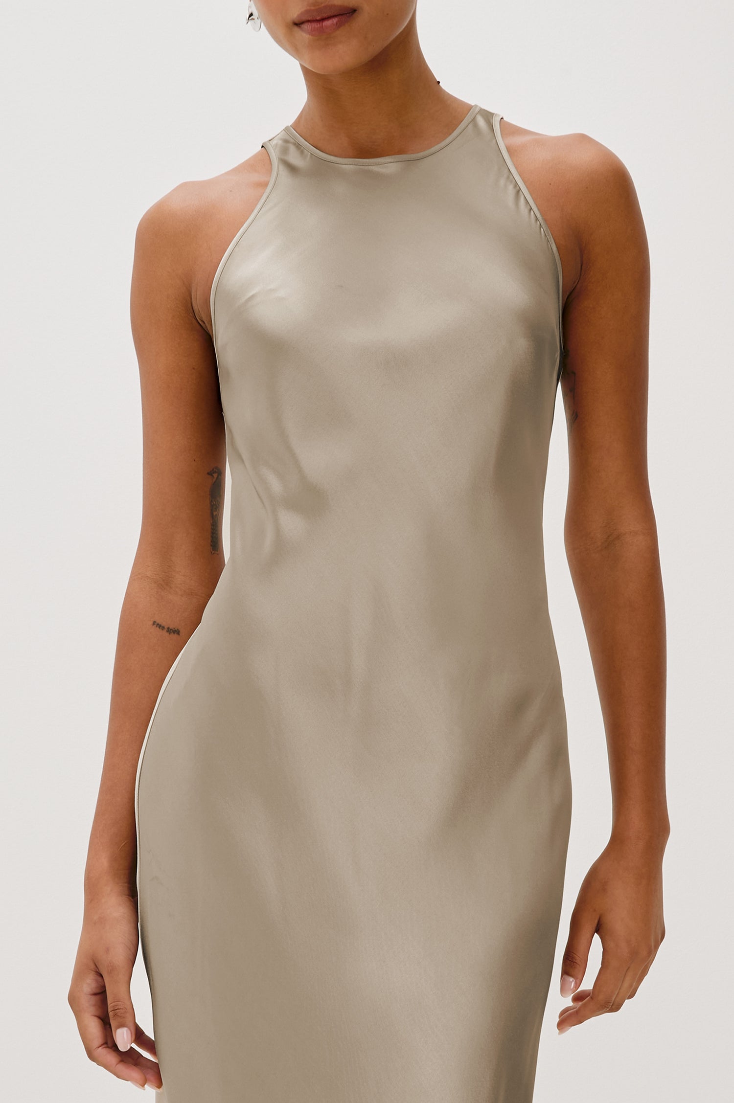 Solene Sleeveless Midi Dress with a Crew Neck and a Tie Keyhole at the Back in Mink Colorway - Close Up View Featured on Model