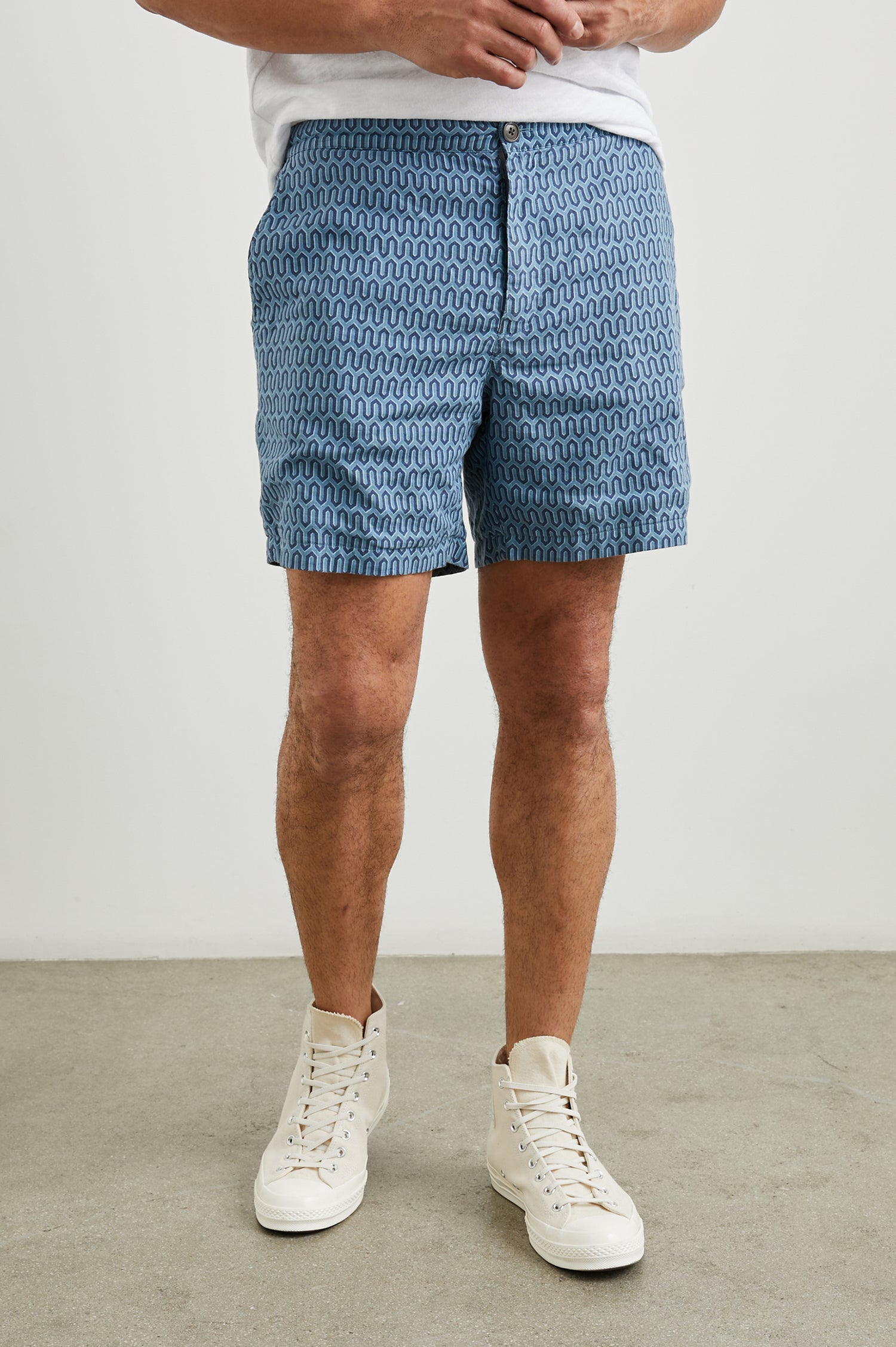 Sona Shorts with Two Front Pockets and Two Back Button Welt Pockets in Wishbone Blues Colorway, a Geometric pattern in Blue on Blues - Front View Featured on Model 