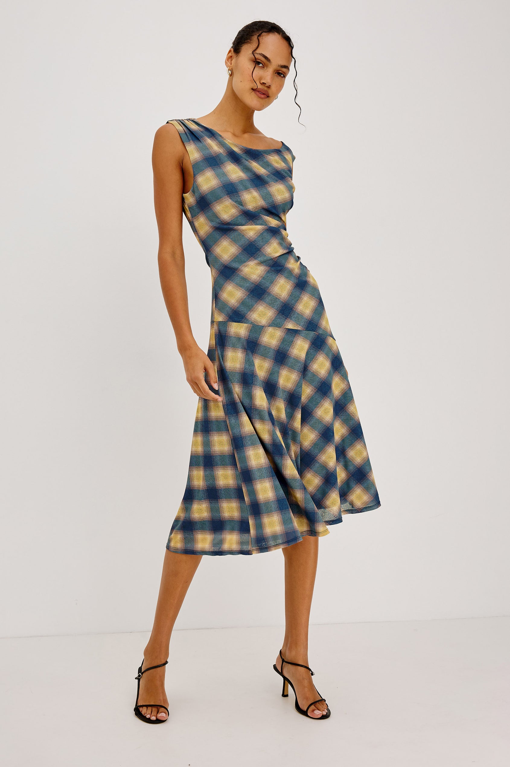 Sorra Midi Dress in Self-Lined Mesh With Asymmetrrical Neckline, Shirred Shoulder Strap, Side Waist Ruching, Bias-Cut Skirt in Navy Sage Plaid Colorway - Full Body Front View Featured on Model