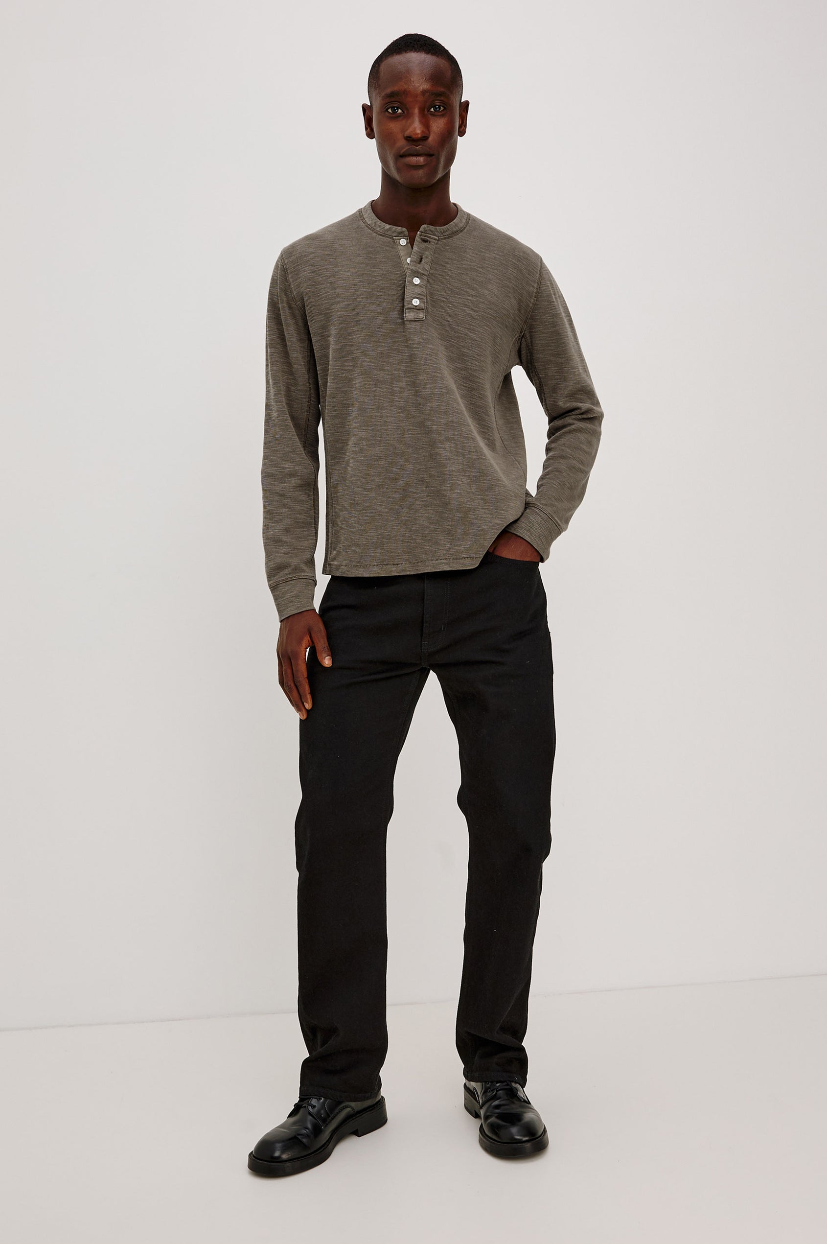 Soto Henley in Cotton French Rib Blend With 4-Button Placket, Tonal Seam Detailing, and Long Sleeves in Crossroad Colorway - Full Body Front View Featured on Model