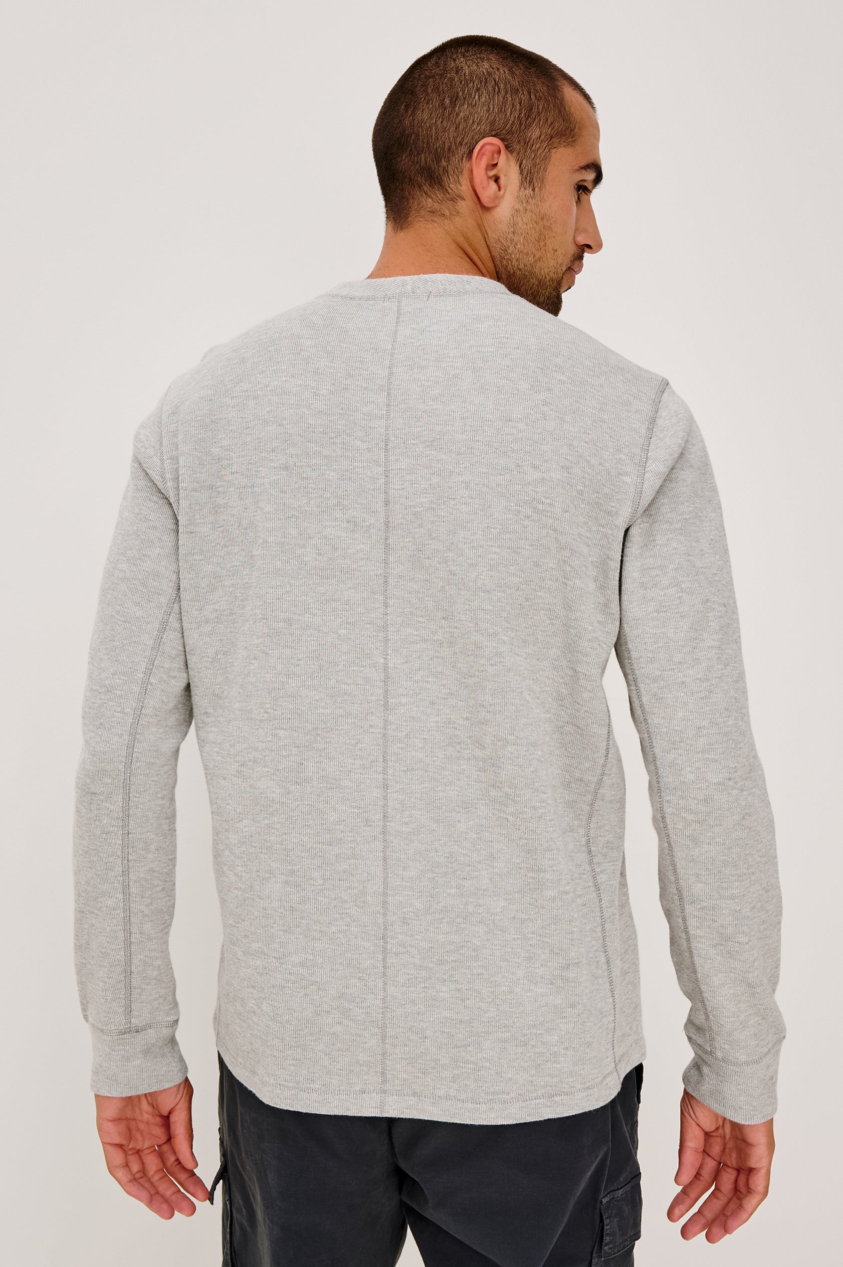 Soto Henley in Rib Cotton With Half Button Placket, Long Sleeves, and Crew Neckline in Grey Heather Colorway - Upper Body Back View Featured on Model