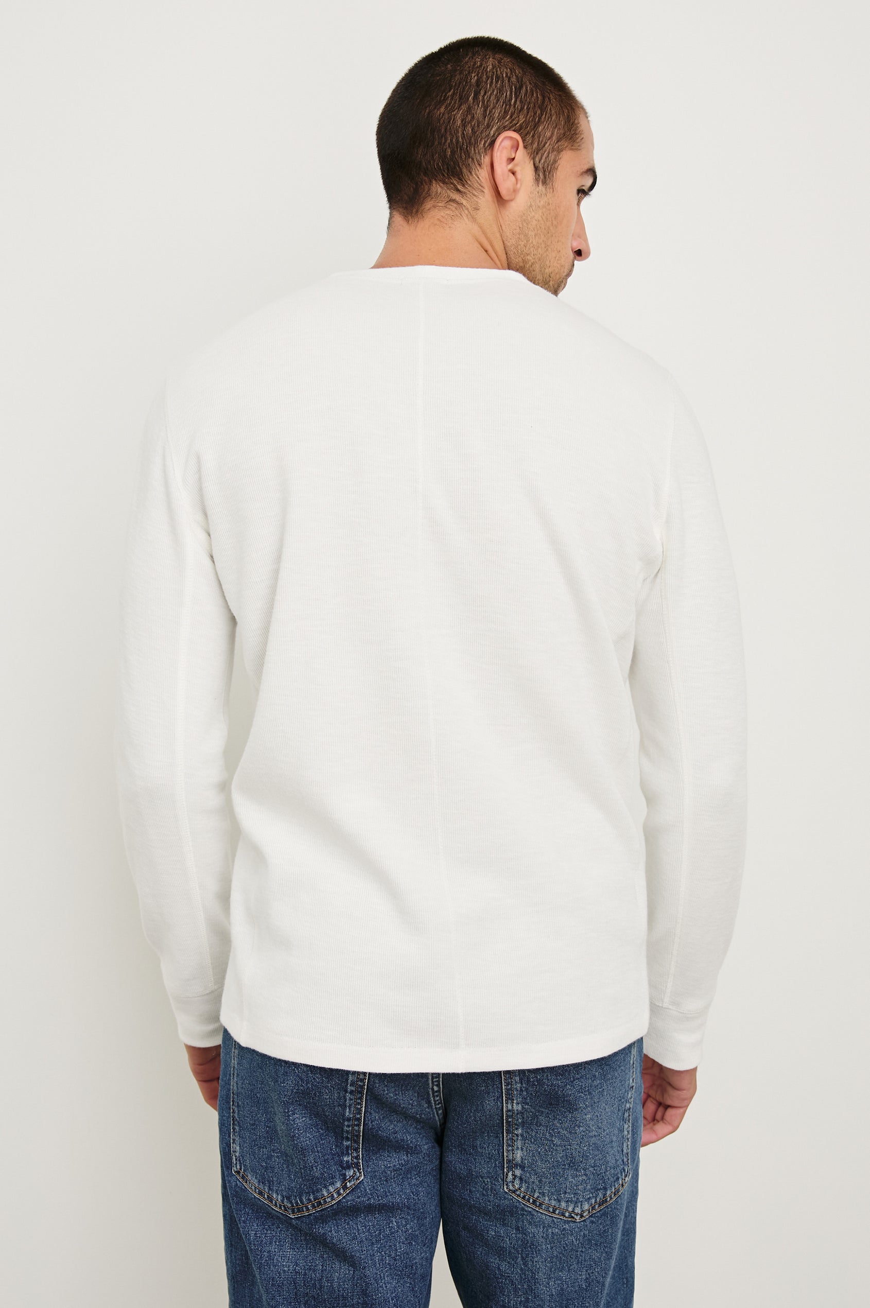 Soto long sleeve henley with front button half placket in Whitecap - back view on model