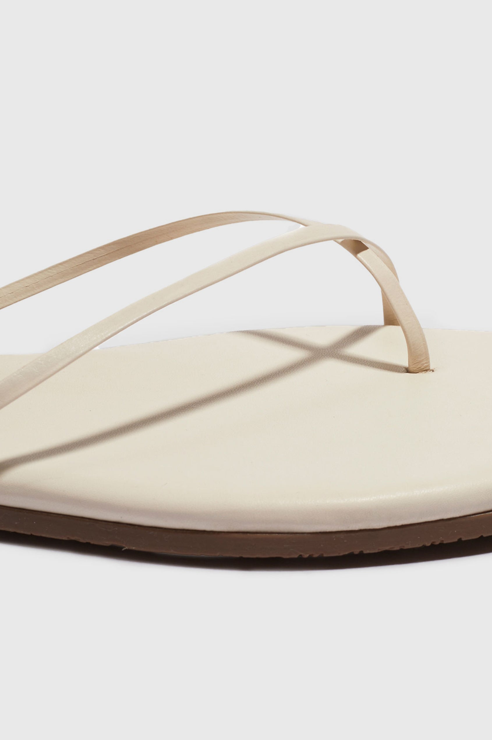 Millie Square toe leather sandal with thin straps wrapping the ankle and front in Cream white - close up of toe details