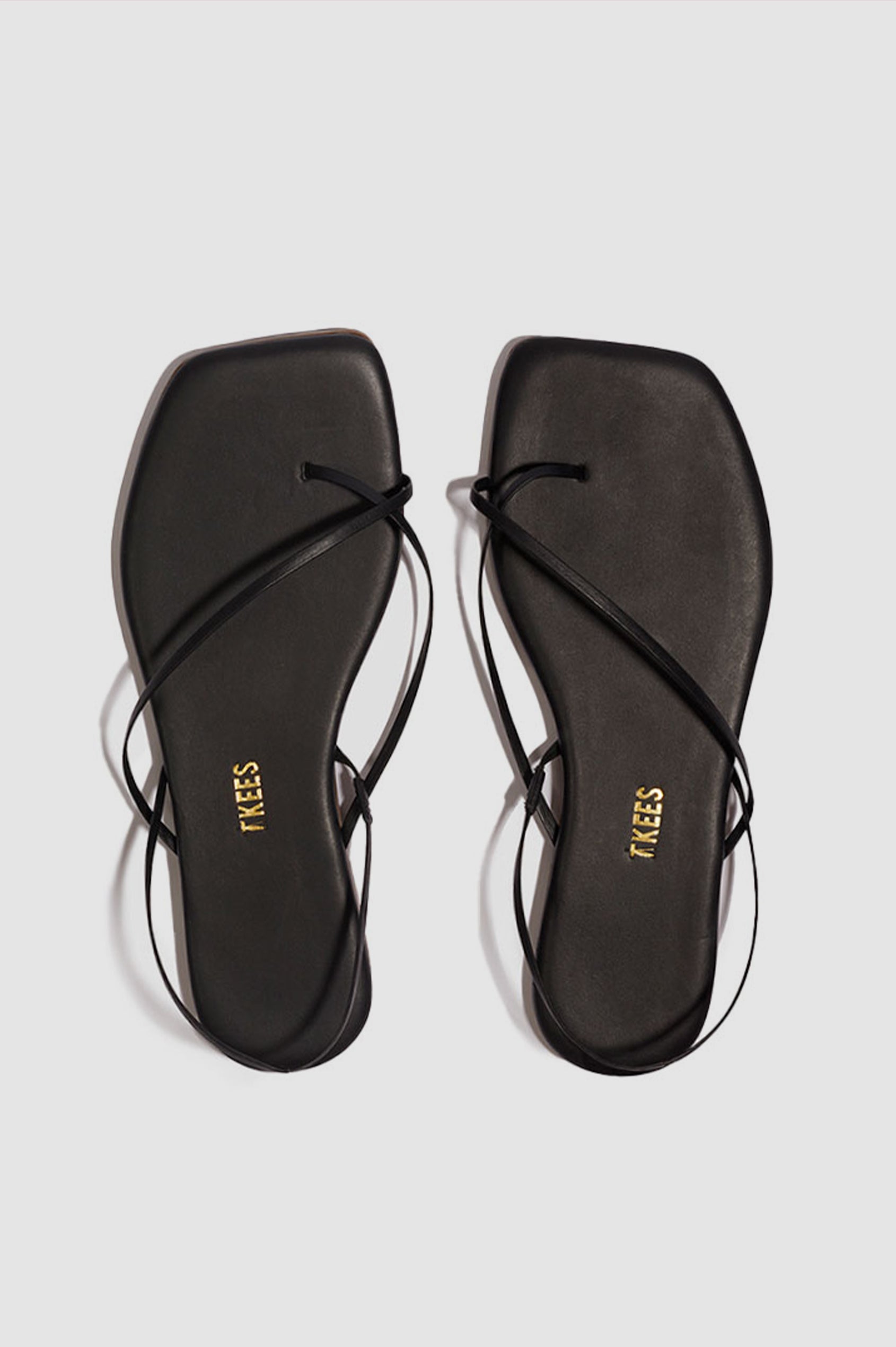 Millie Square toe leather sandal with thin straps wrapping the ankle and front in Sable black - pair of shoes shot from above angle