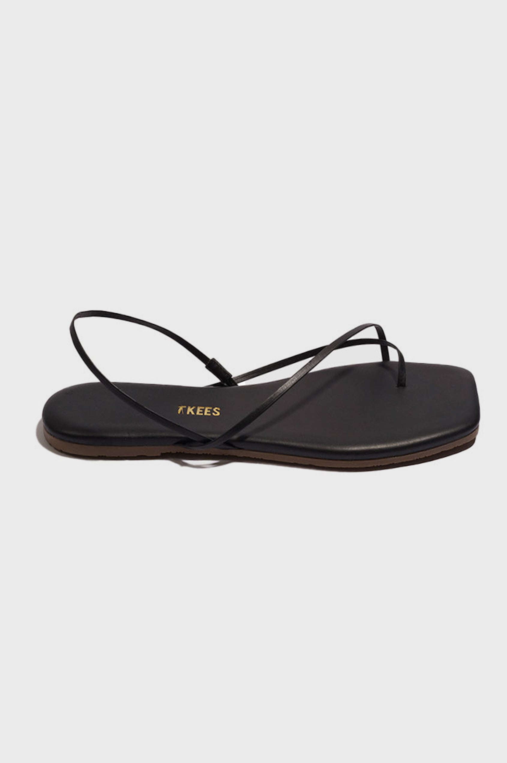 Millie Square toe leather sandal with thin straps wrapping the ankle and front in Sable black - side view of single shoe