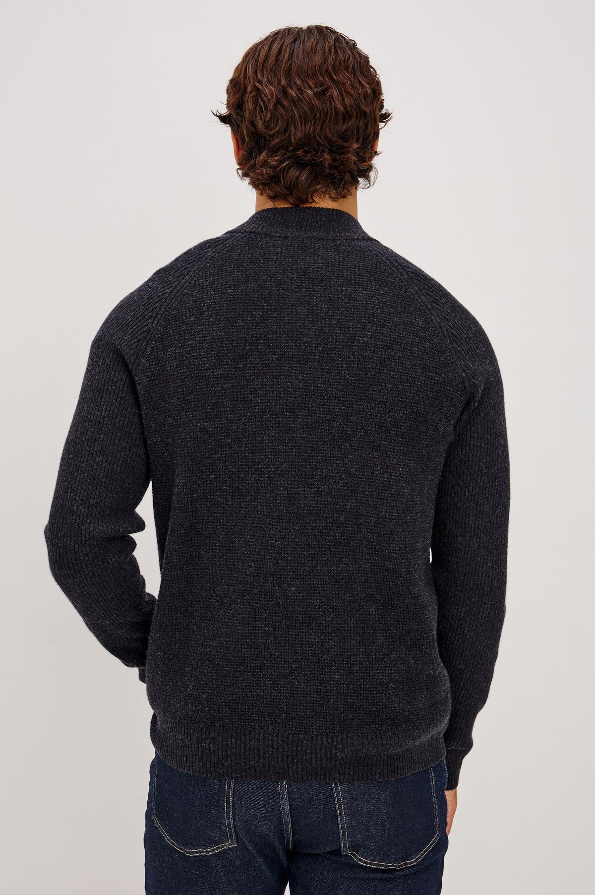 Stark Sweater in Waffle Knit With Quarter-Zip Placket, Mock Neck Collar, and Long Sleeves in Cast Iron Colorway - Upper Body Back View Featured on Model.