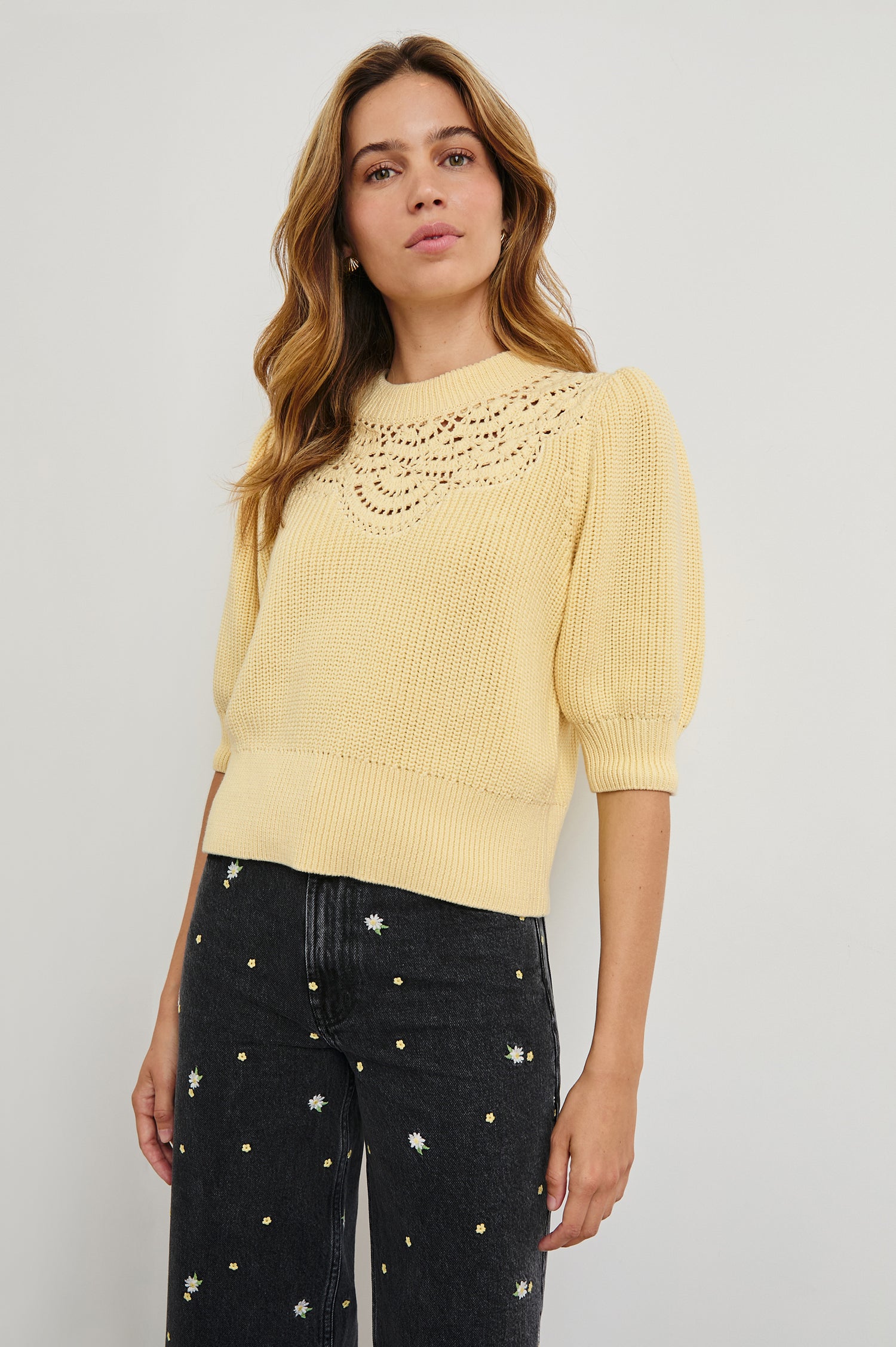 Steph Sweater with Elbow Length Sleeves, Ribbed Trims, a Crew Neck and Crochet on the Upper Chest in Meringue Colorway - Front View Featured on Model
