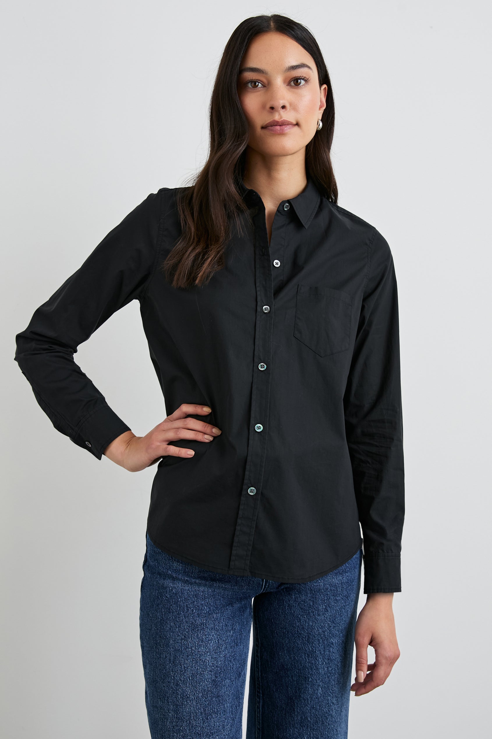 Stina Long-Sleeve Button Up with a Chest Patch Pocket in Black Colorway - Front View Featured on Model