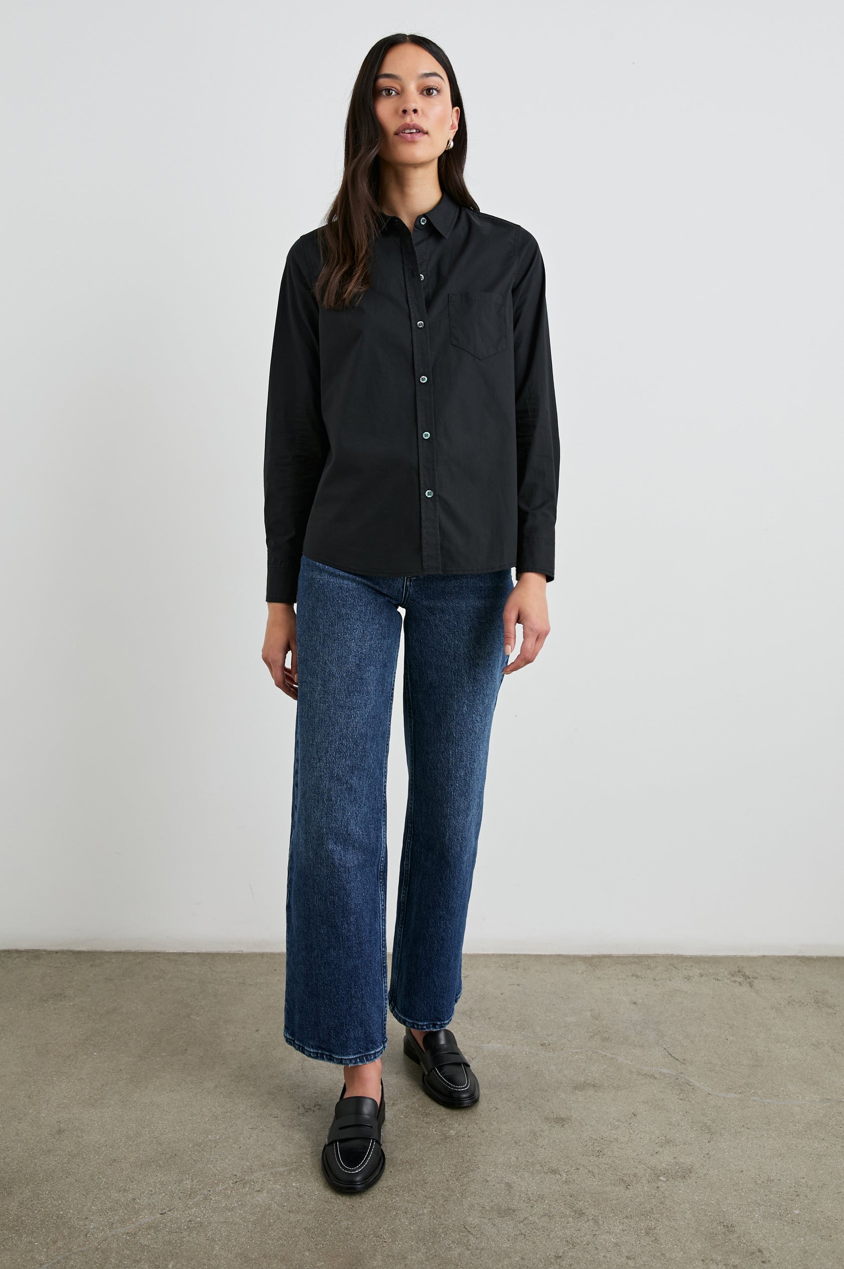 Stina Long-Sleeve Button Up with a Chest Patch Pocket in Black Colorway - Front View Featured on Model
