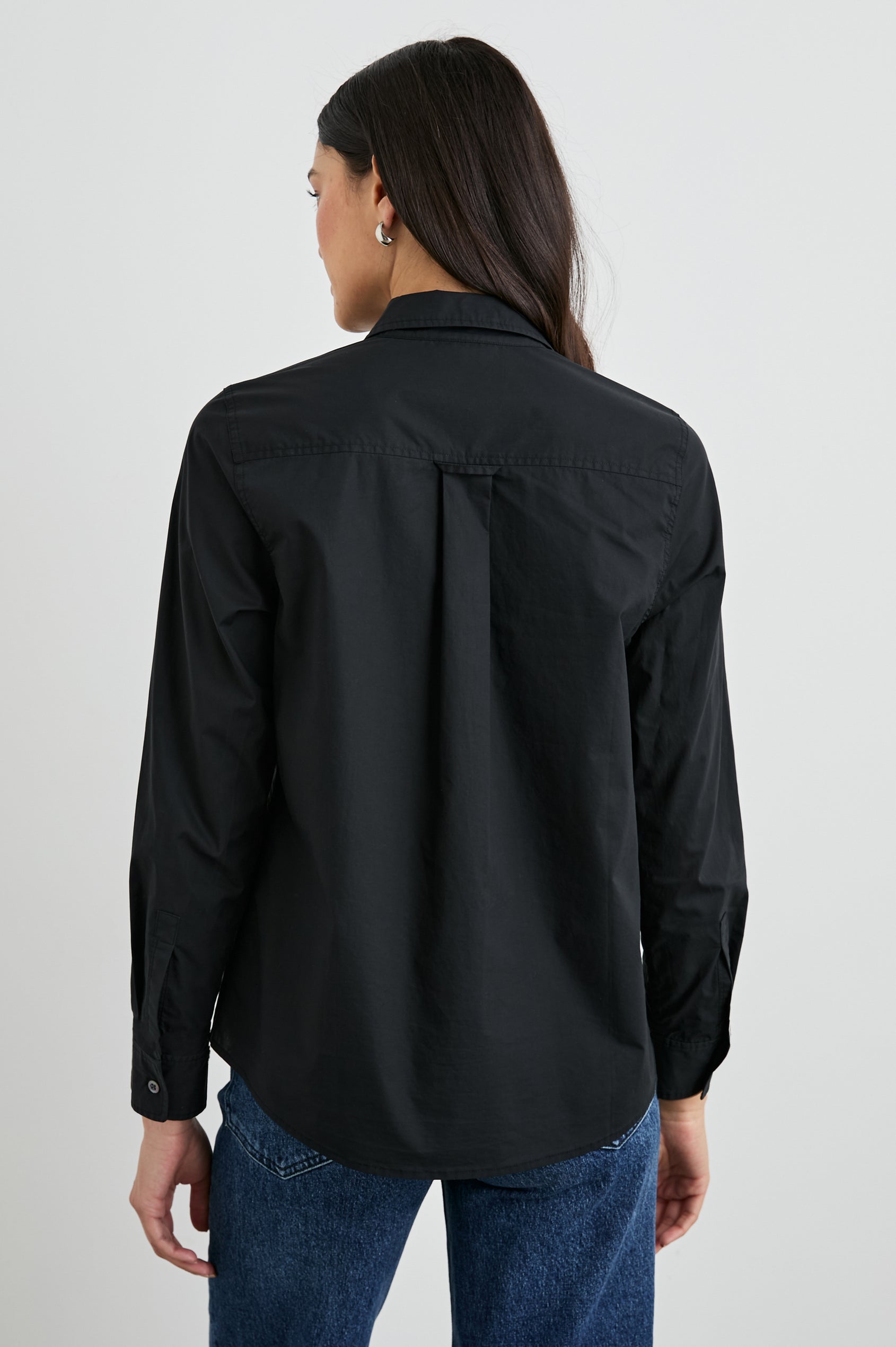 Stina Long-Sleeve Button Up with a Chest Patch Pocket in Black Colorway - Back View Featured on Model