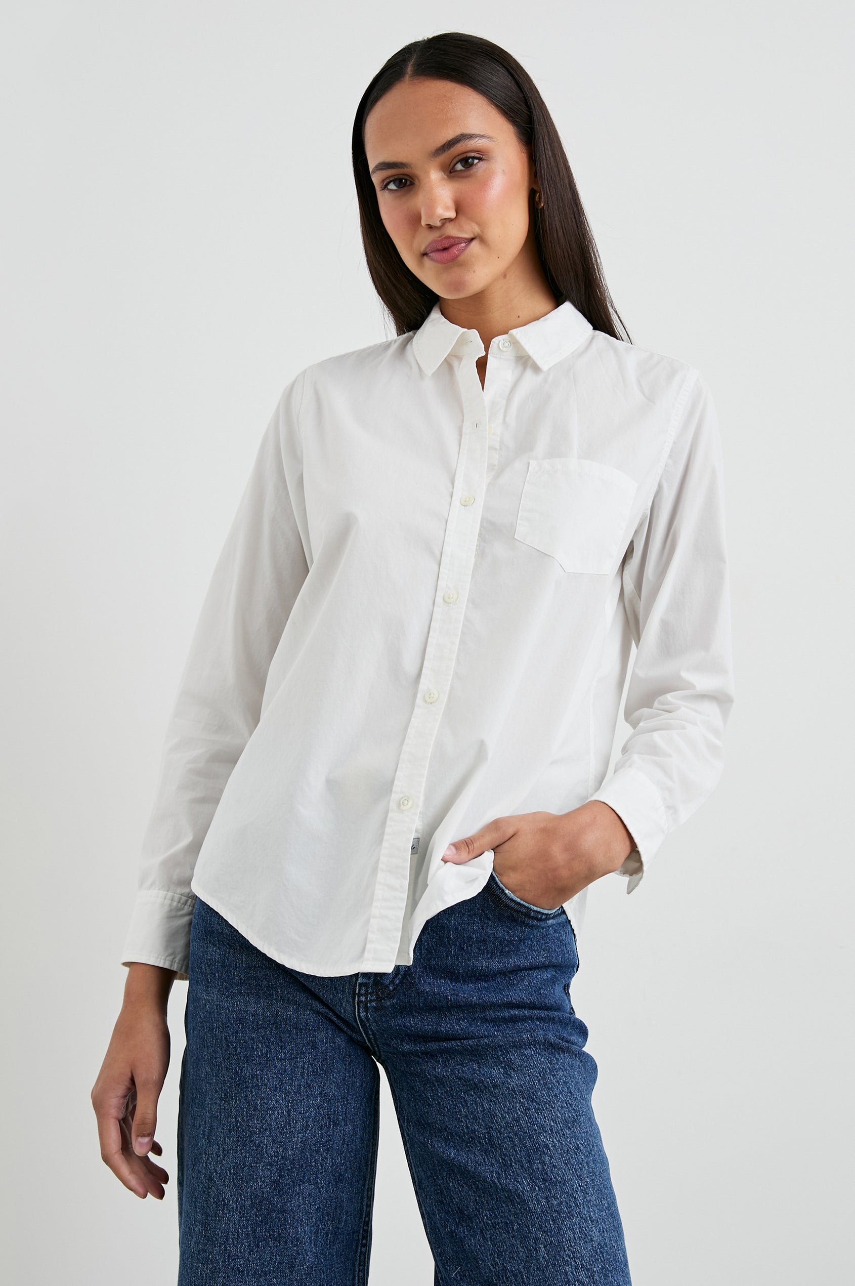 Stina Long-Sleeve Button Up with a Chest Patch Pocket in White Colorway - Front View Featured on Model