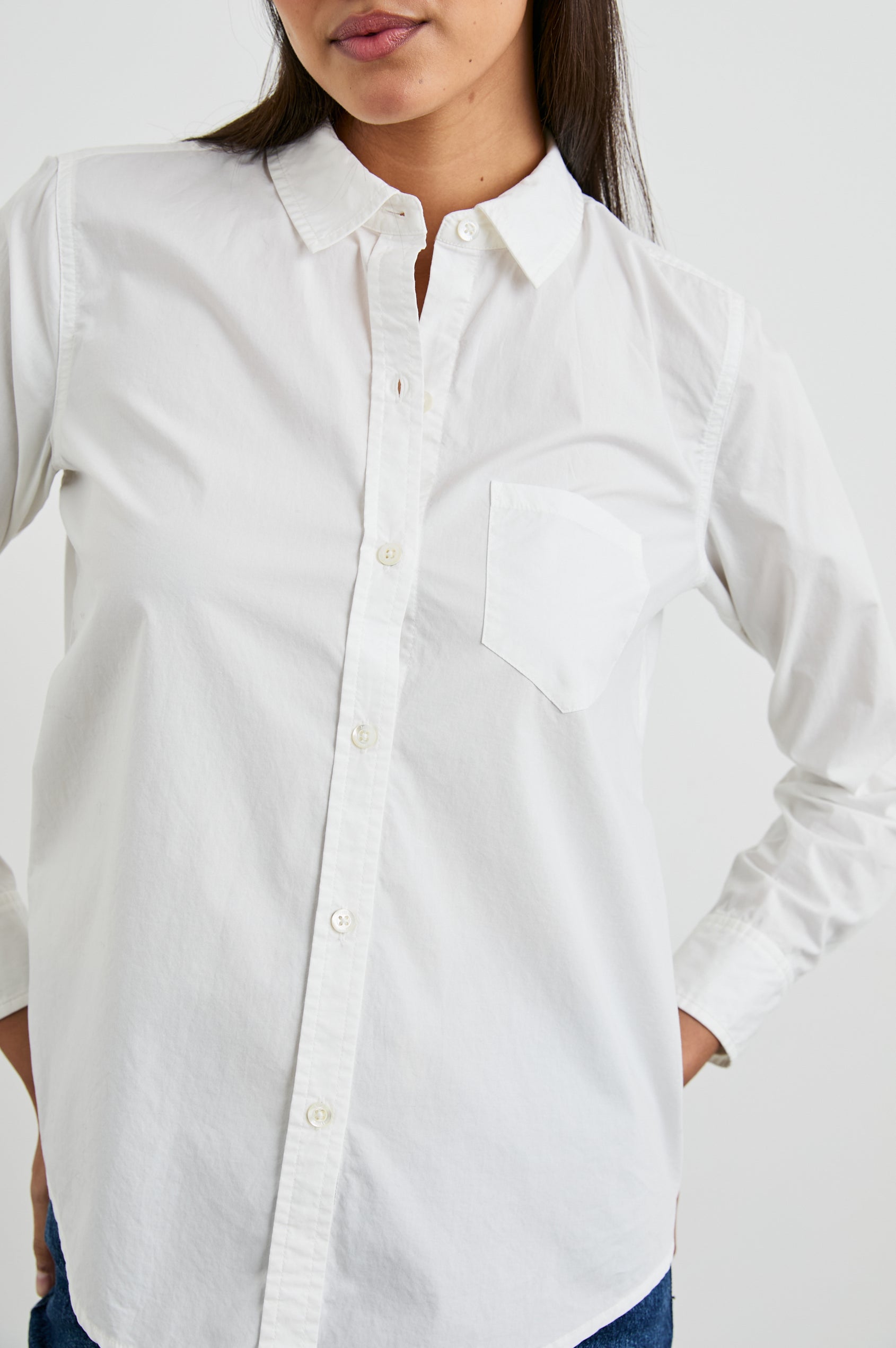 Stina Long-Sleeve Button Up with a Chest Patch Pocket in White Colorway - Front View Featured on Model