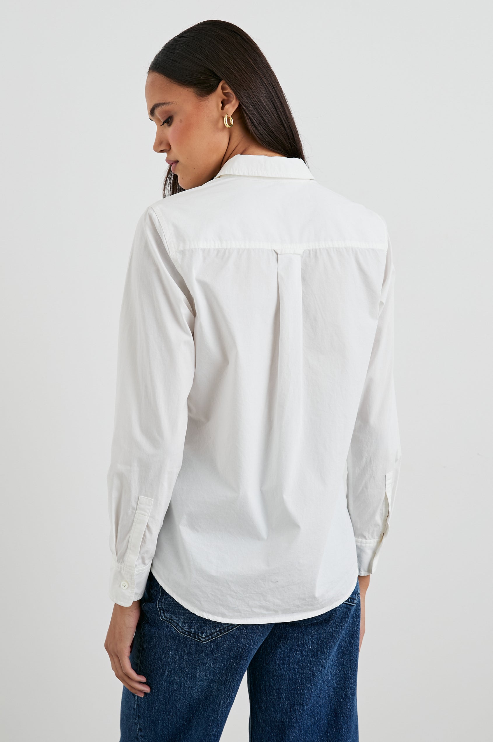 Stina Long-Sleeve Button Up with a Chest Patch Pocket in White Colorway - Back View Featured on Model