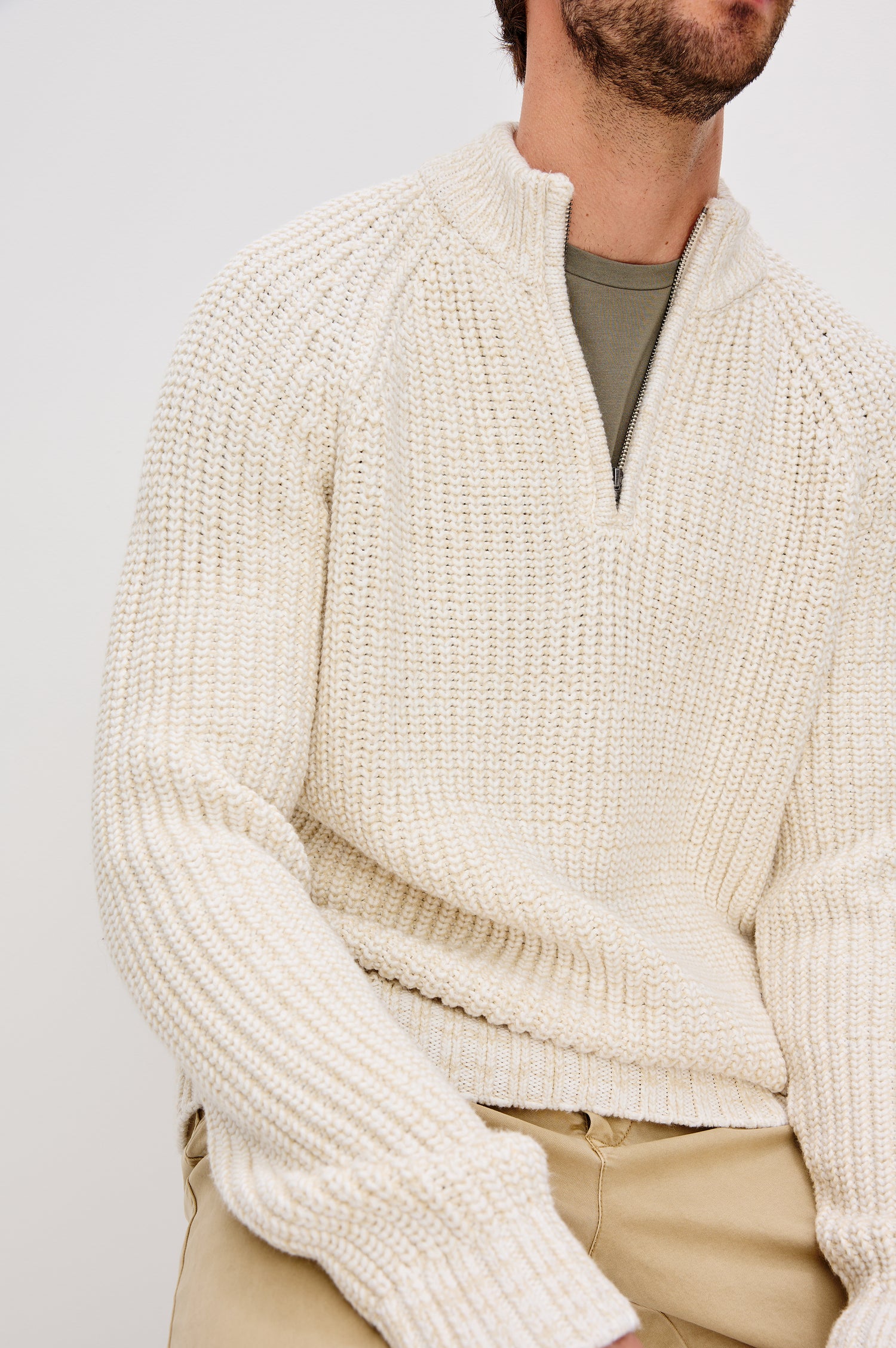 Stratton Quarter Zip Sweater in Chunky Cotton Blend Knit With Stand Collar, Long Sleeves, and Ribbed Trim in Snowdrift Marl Colorway - Upper Body Front Close Up View Featured on Model