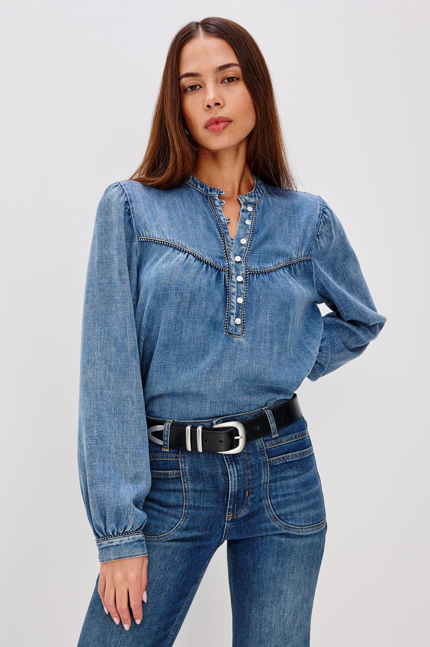 Sunna TENCEL™ Denim Shirt With Medium Wash, Front and Back Yoke Details, Half Front Placket With Shell Buttons, Two-Toned Twist Piping, and Long Sleeves With Shirred Shoulders and Fitted Cuffs in Blue Stone Colorway