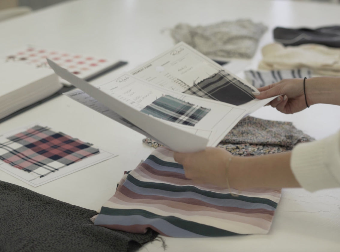 IMAGE OF FABRIC SAMPLES ON A TABLE