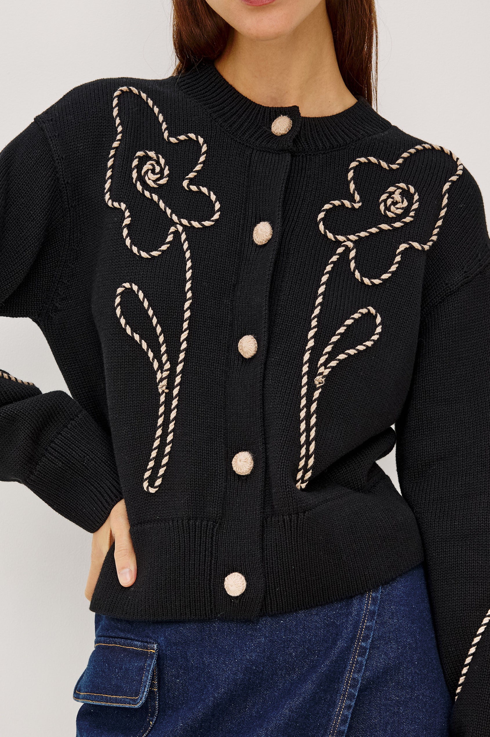 Sybil Cardigan in Cotton Knit With Boxy Fit, Crew Neckline, Soutache Embroidered Florals, Crochet Front Buttons, and Long Sleeves in Western Floral Colorway - Upper Body Front View Featured on Model