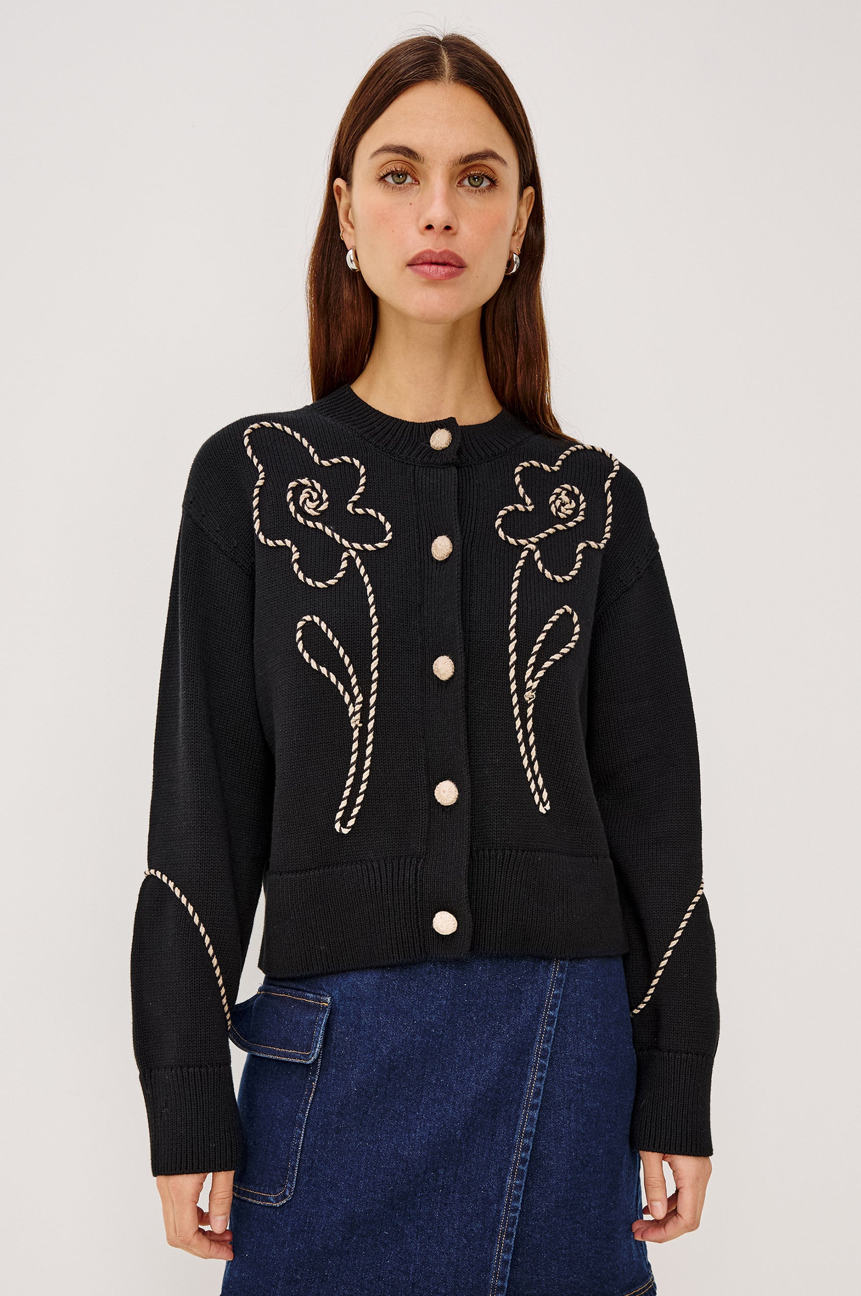 Sybil Cardigan in Cotton Knit With Boxy Fit, Crew Neckline, Soutache Embroidered Florals, Crochet Front Buttons, and Long Sleeves in Western Floral Colorway - Upper Body Front View Featured on Model