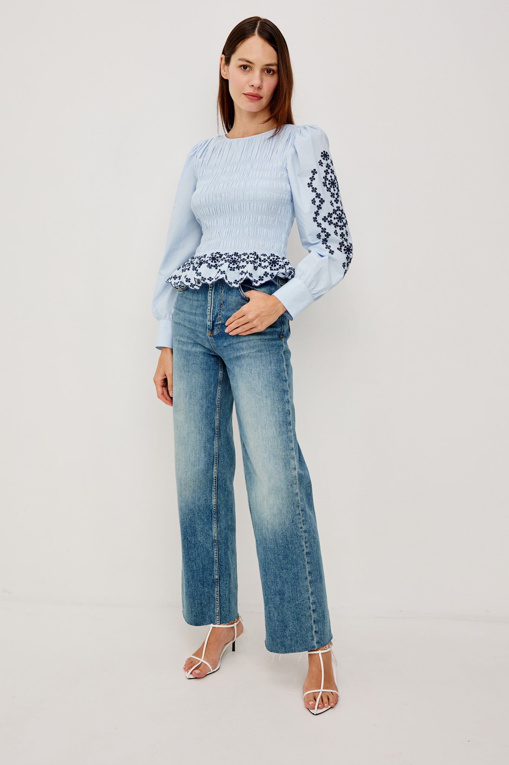 Tabi Blouse Top in Poplin With Smocked Body, Long Puff Sleeves With Fitted Cuffs, Contrast Embroidered Detailing, and Back Keyhole Cutout in Blue Bird Colorway - Full Body Front View Featured on Model