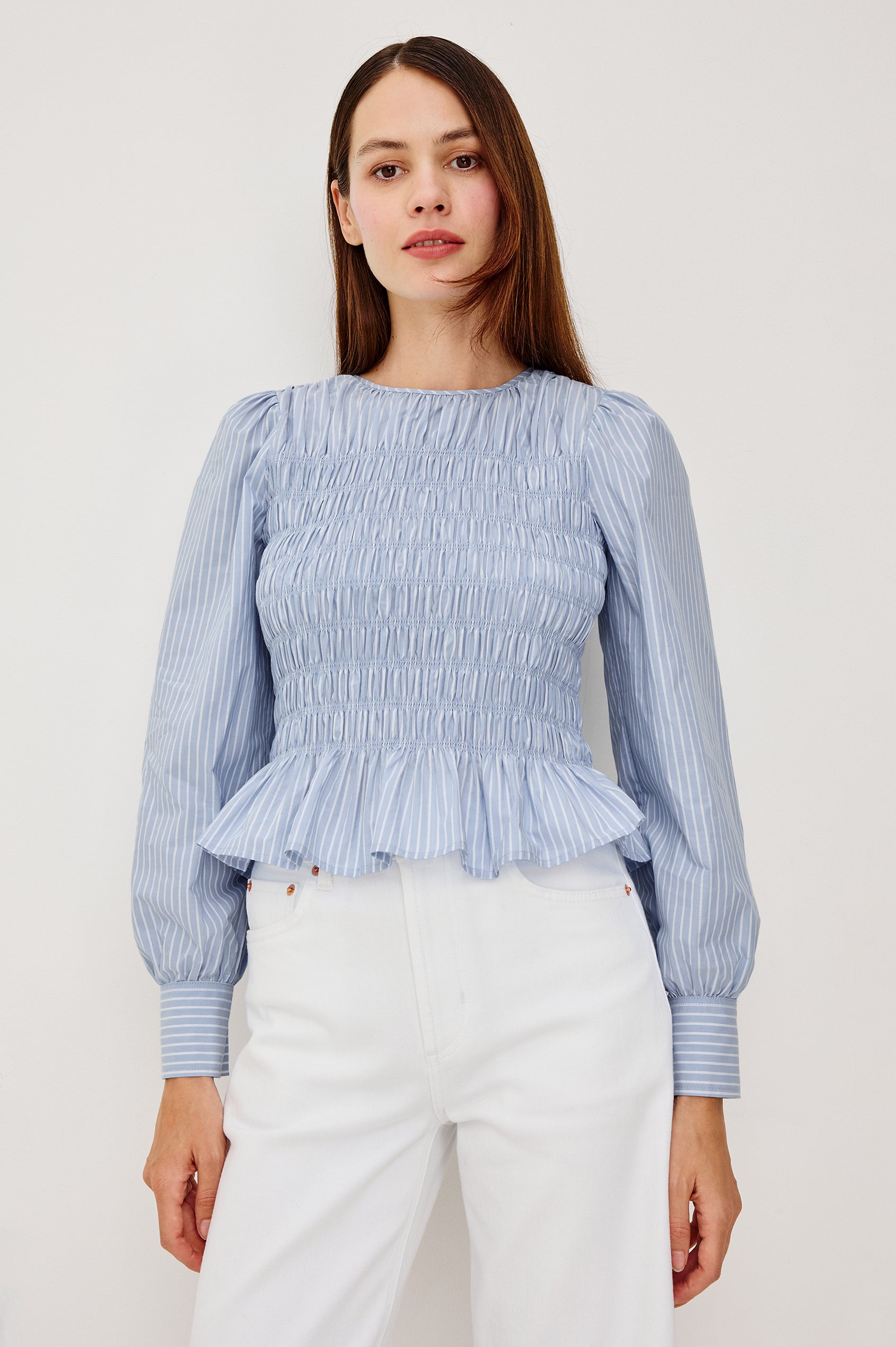 Tabi Blouse Top in Poplin With Smocked Body, Long Puff Sleeves With Fitted Cuffs, Contrast Embroidered Detailing, and Back Keyhole Cutout in White Stripe Colorway - Full Body Front View Featured on Model