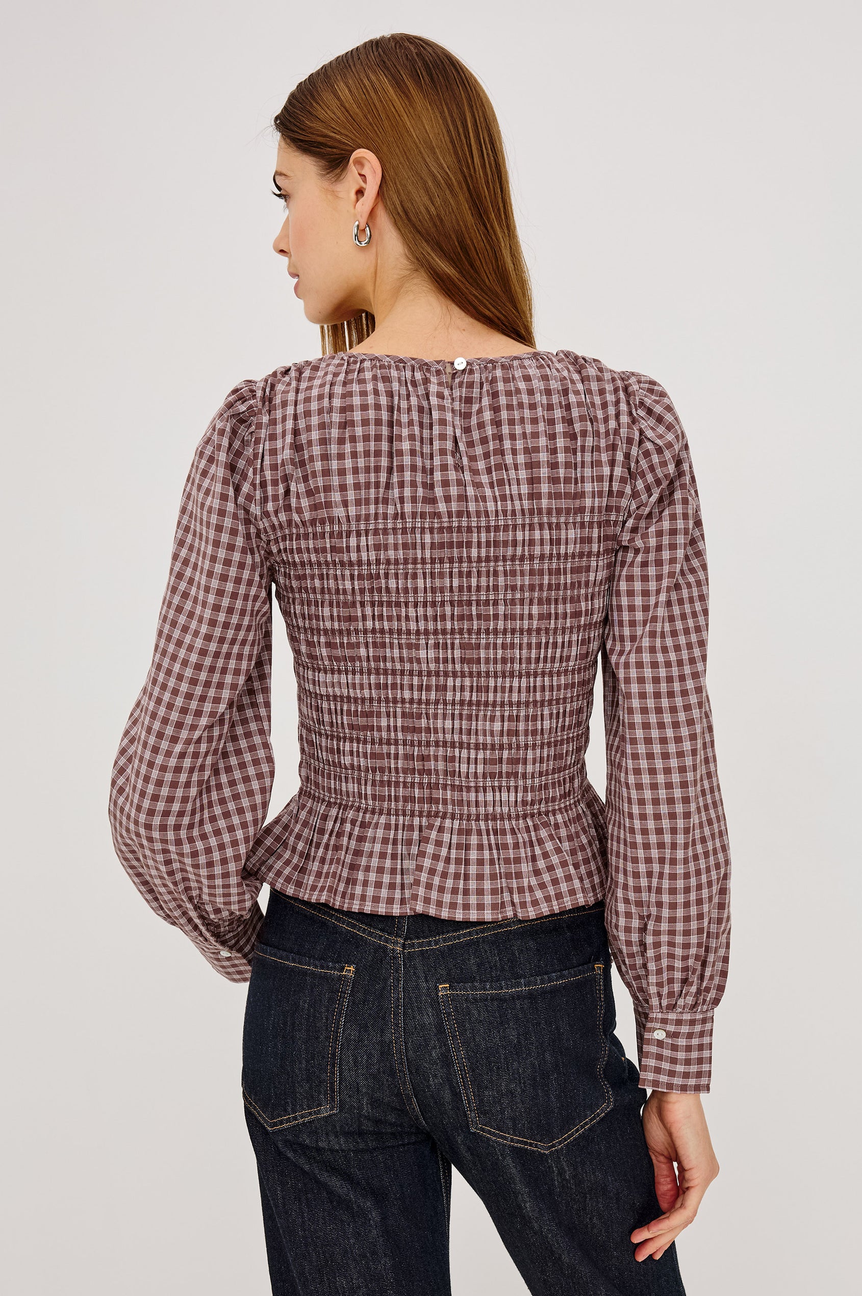 Tabi Shirt in Cotton Poplin With Fitted Smocked Bodice, Flared Peplum Hem, Long Puff Sleeves, and Shirred Neckline in Rust Rose Colorway - Upper Body Back View Featured on Model