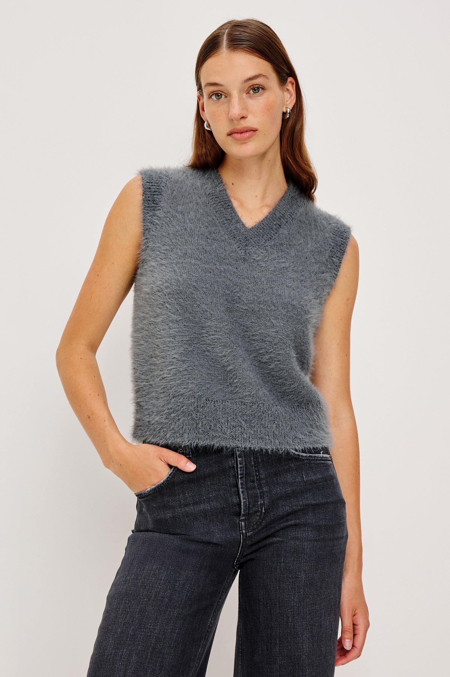 Talli sleeveless knit vest in Heather Charcoal grey with a classic v-neckline for layering - front view featured on model.
