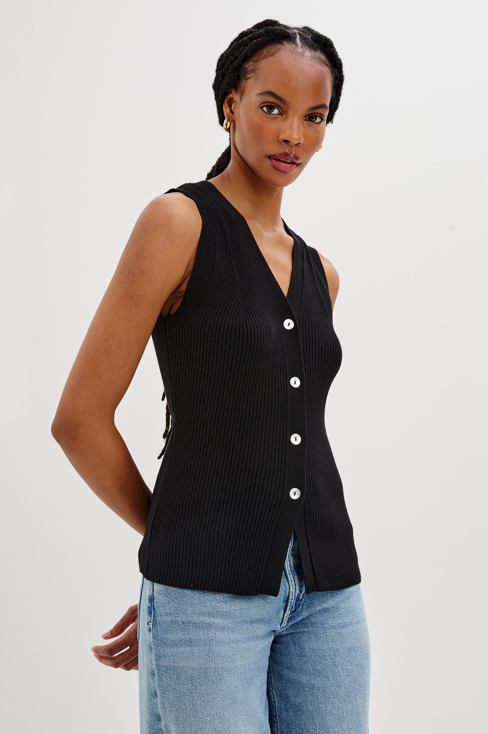 Tatia V-Neck Button Front Vest in Black Colorway. Front View Shown on Model.