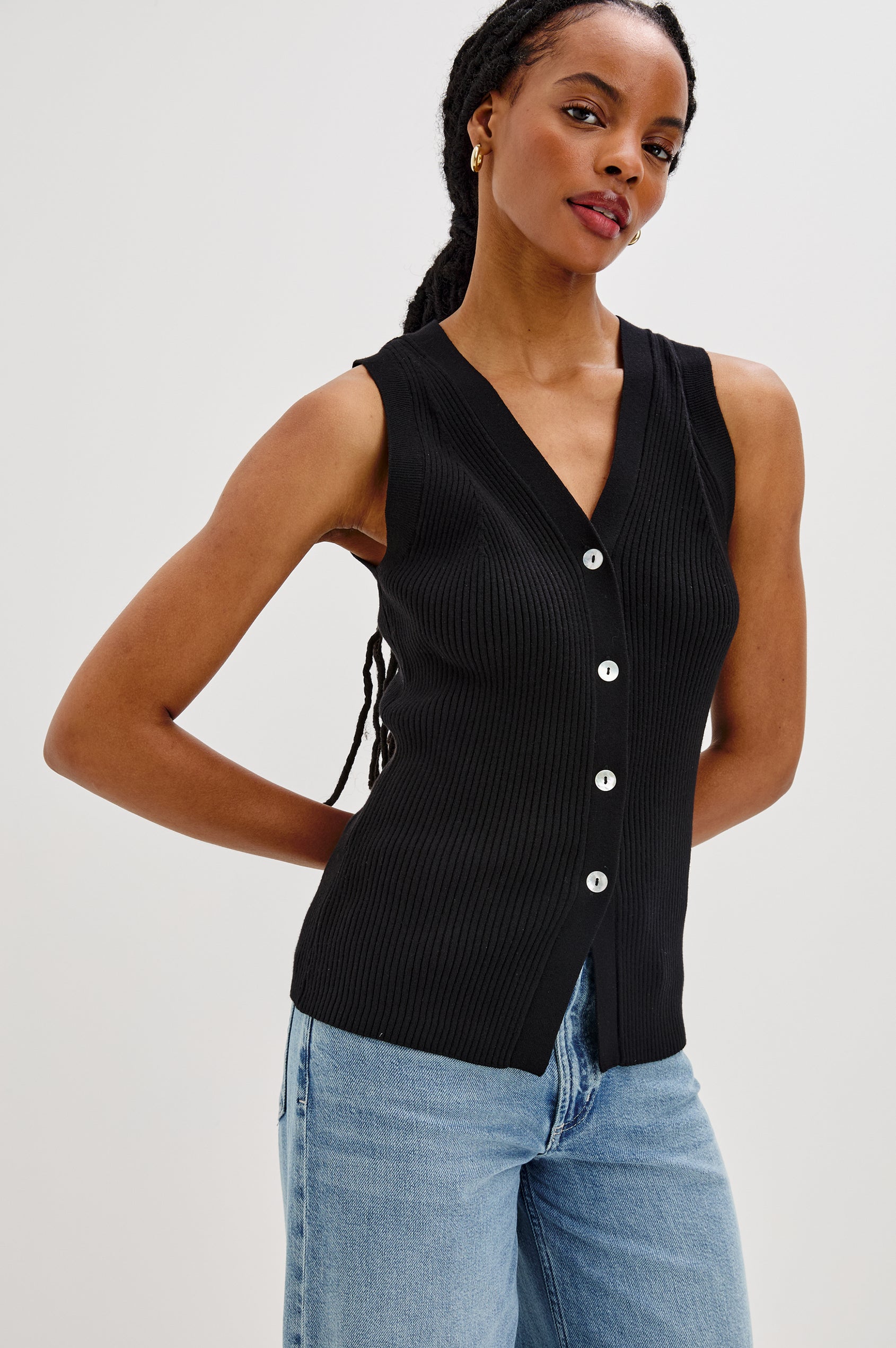 Tatia V-Neck Button Front Vest in Black Colorway. Front View Shown on Model.