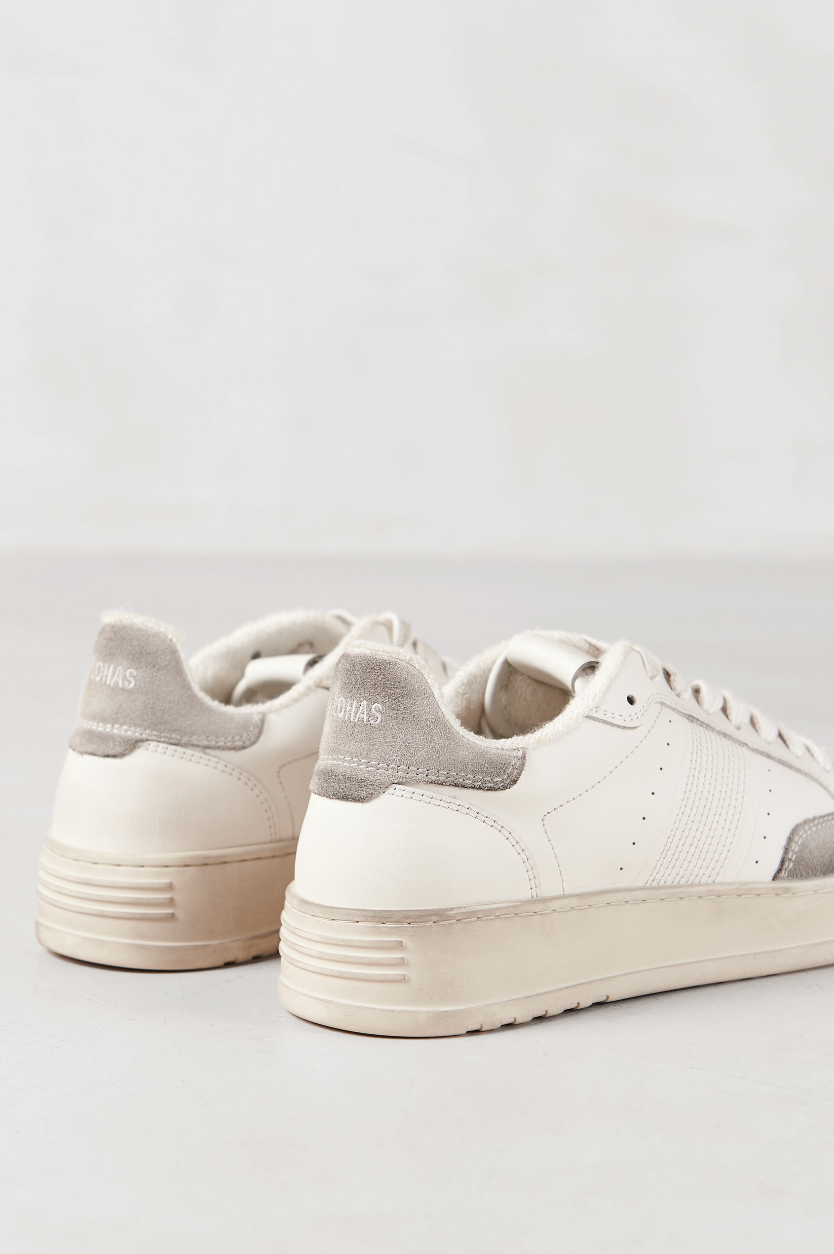 TB.780 low top, lace up sneaker with thick rubber soles, suede panels, and distressing details in Dusty Light Grey - TB.780 low top, lace up sneaker with thick rubber soles, suede panels, and distressing details in Dusty Light Grey - back view of shoe pair