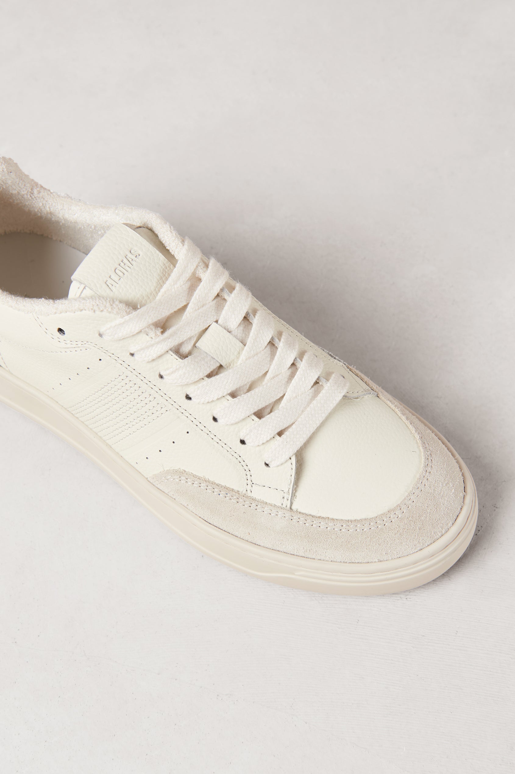 TB.780 low top, lace up sneaker with thick rubber soles, suede panels, and distressing details in Grain Suede Pink - single shoe view shot from above