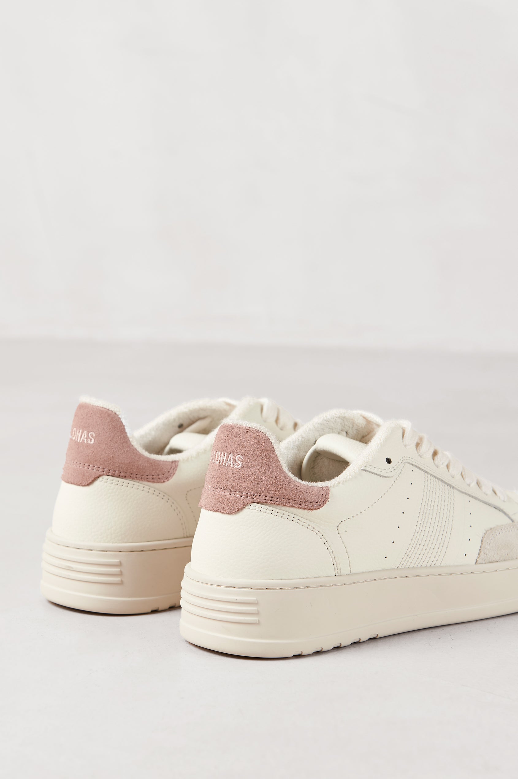 TB.780 low top, lace up sneaker with thick rubber soles, suede panels, and distressing details in Grain Suede Pink - back view of shoe pair