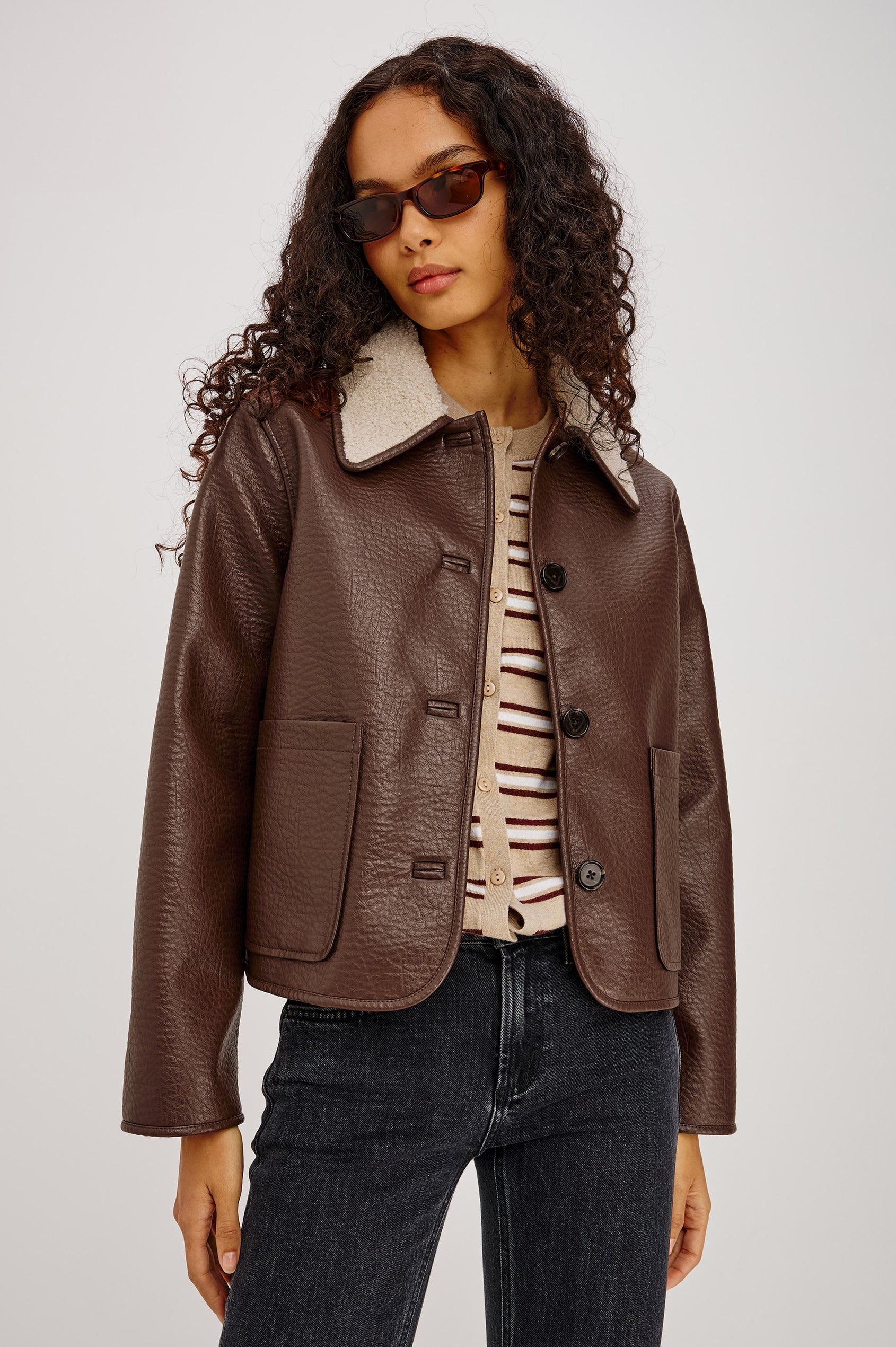 Terra Jacket in Pebbled Vegan Leather With Vegan Shearling Collar and Lining, Slightly Cropped Fit, Front Buttons, and Patch Pockets in Espresso Colorway - Full Body Front View Featured on Model