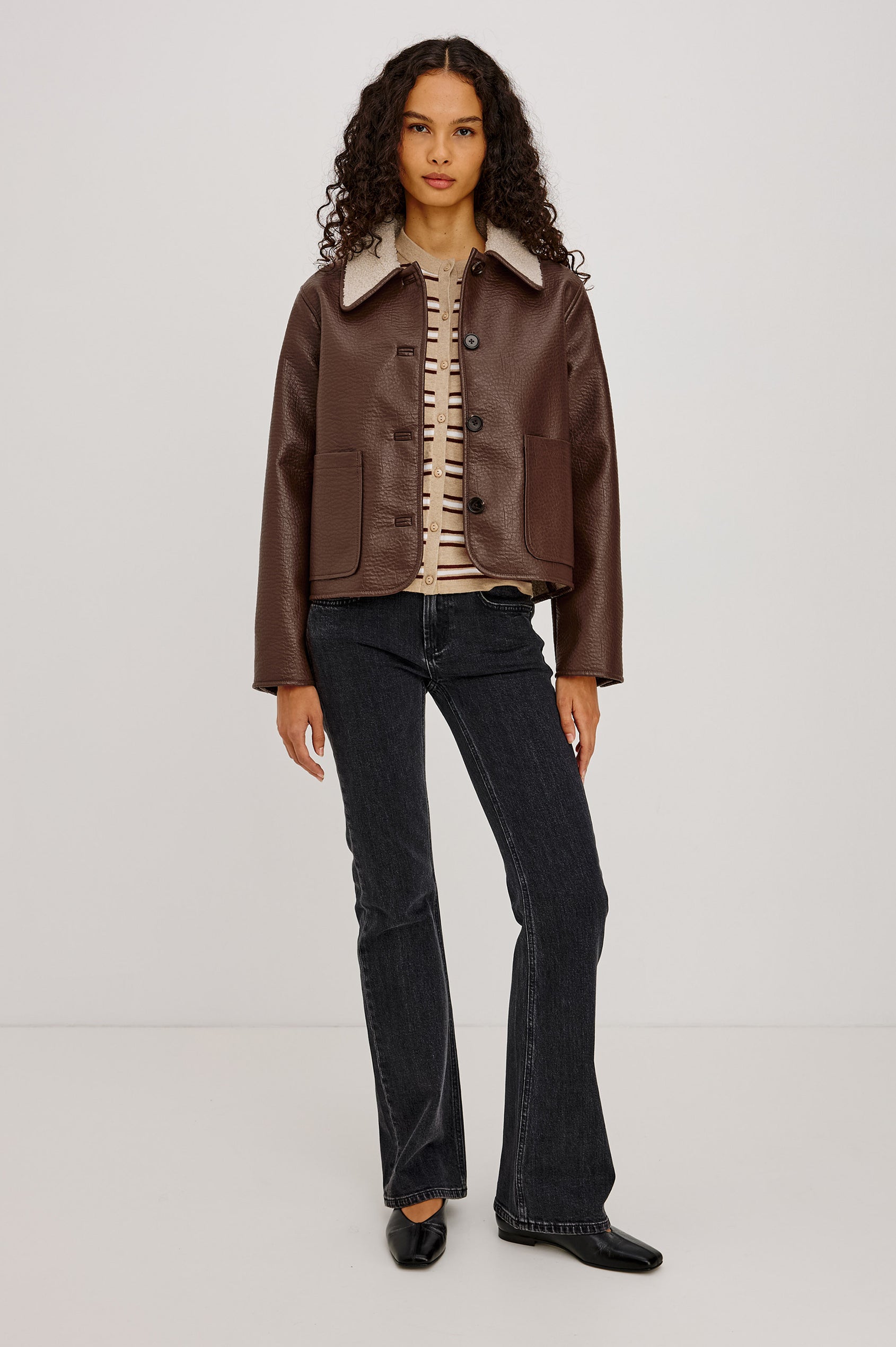 Terra Jacket in Pebbled Vegan Leather With Vegan Shearling Collar and Lining, Slightly Cropped Fit, Front Buttons, and Patch Pockets in Espresso Colorway - Upper Body Front View Featured on Model