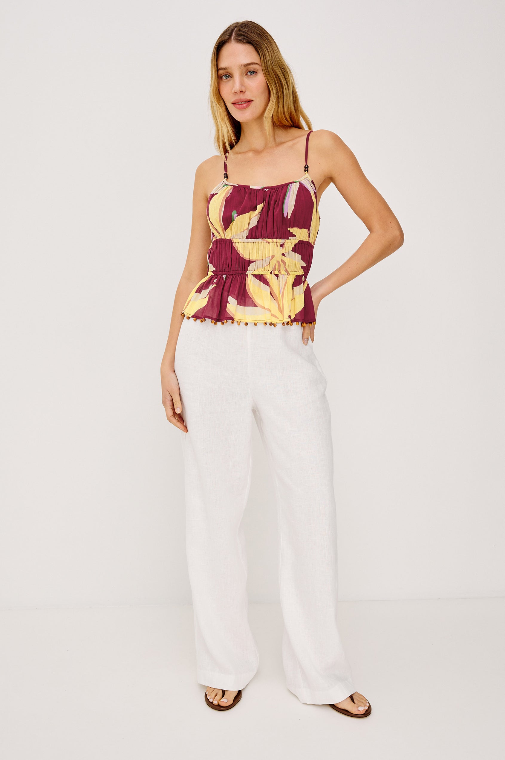 Theda Cropped Tank Top in Cotton Voile With Adjustable Shoulder Straps With Wooden Bead Detailing, and Elastic Tiered Waist in Red Palm Colorway - Full Body Front View Featured on Model