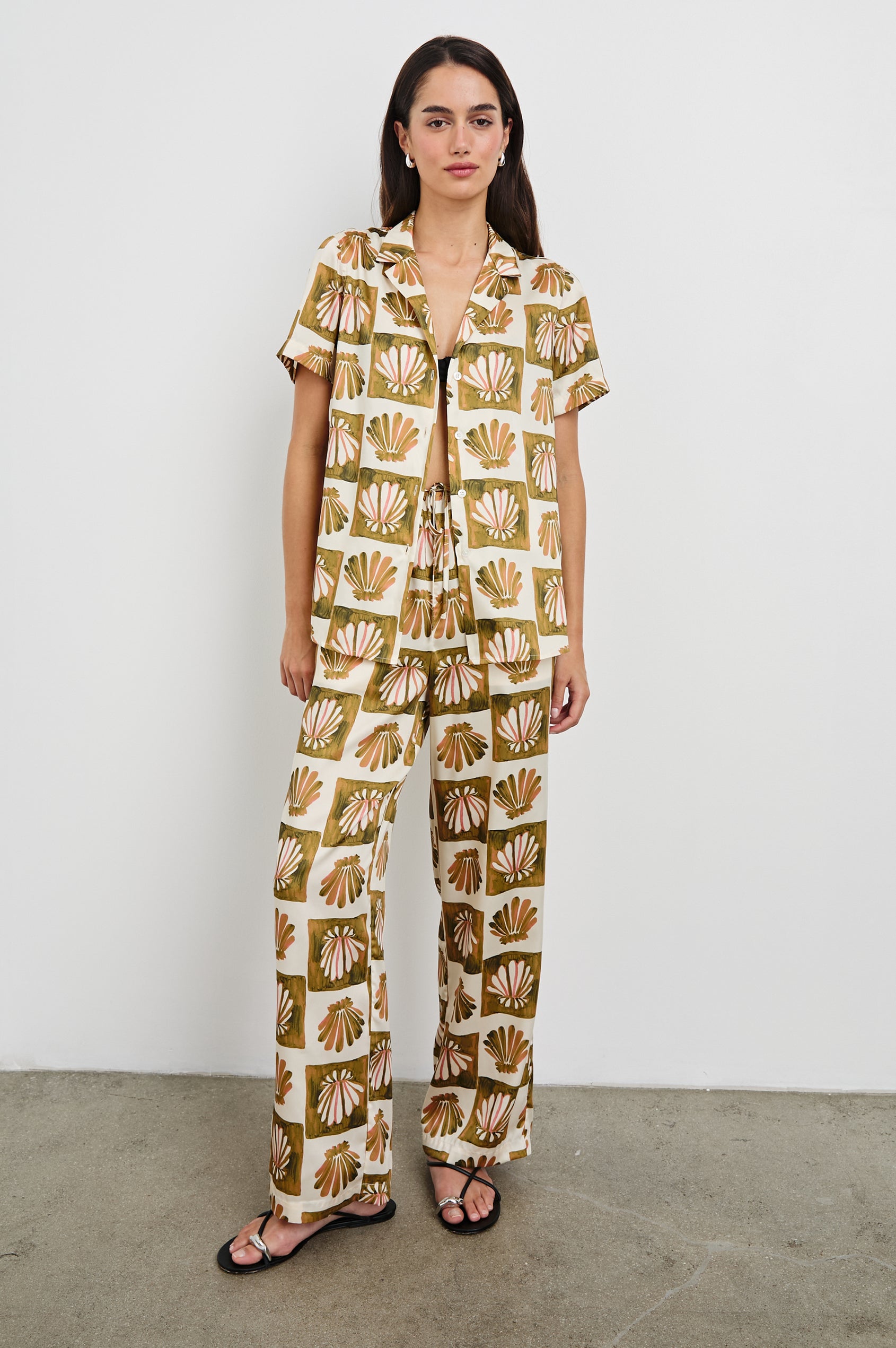 Theis Oversized Collared Button Front Shirt with Short Sleeves in Checkered Shells Colorway. Front View Shown on Model.