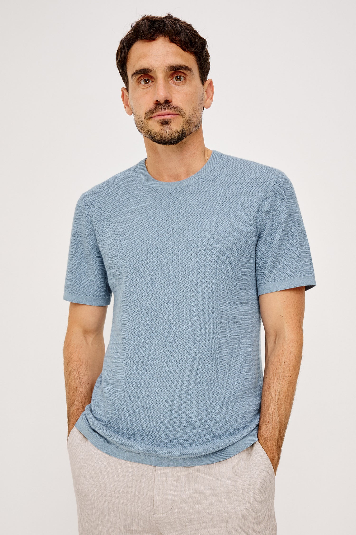 Theo T-Shirt in Ribbed Cotton-Cashmere With Crew Neckline, Short Sleeves, and Classic Fit in Blue Sky Heather Colorway - Upper Body Front View Featured on Model