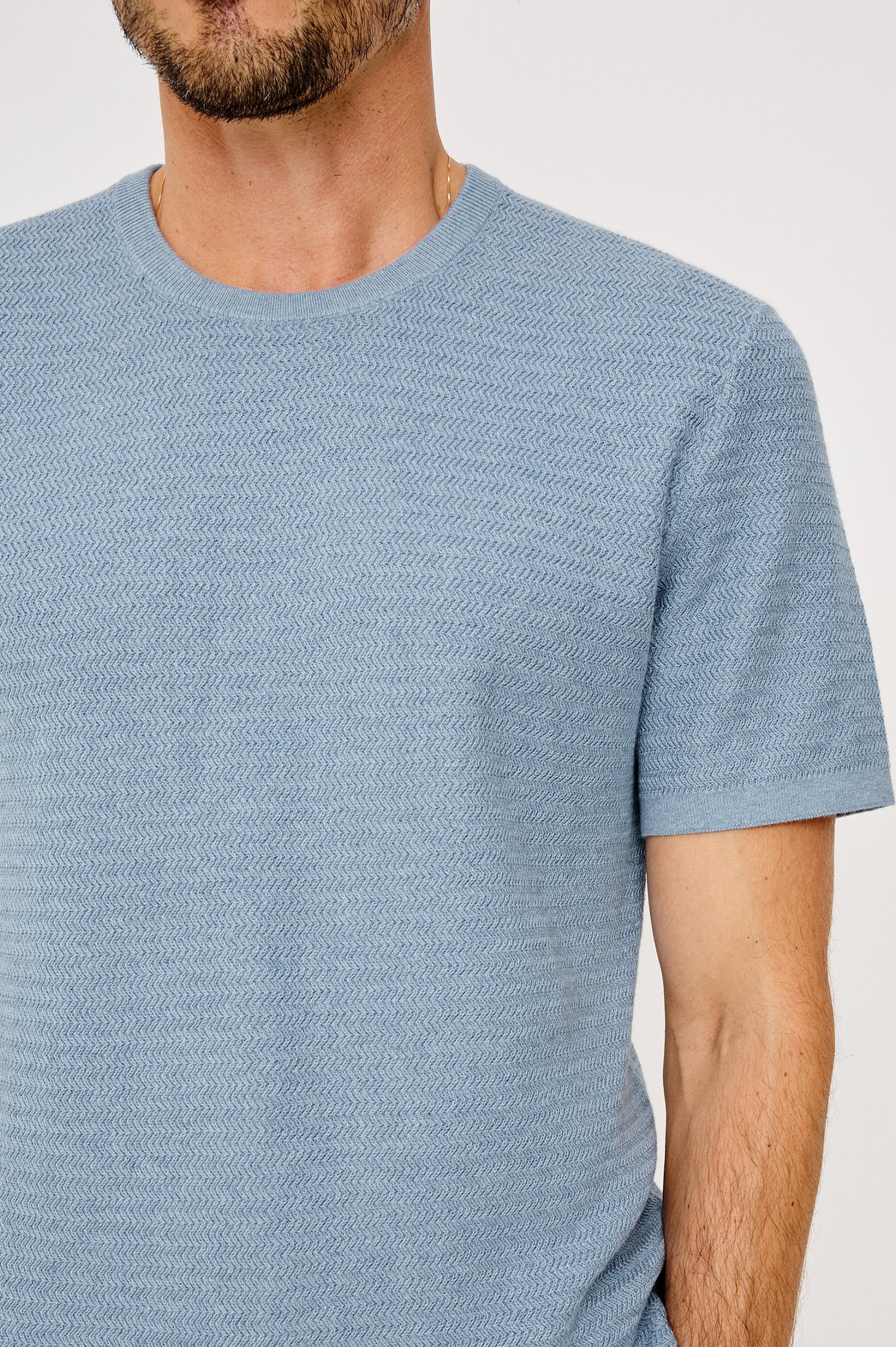Theo T-Shirt in Ribbed Cotton-Cashmere With Crew Neckline, Short Sleeves, and Classic Fit in Blue Sky Heather Colorway - Upper Body Front View Featured on Model