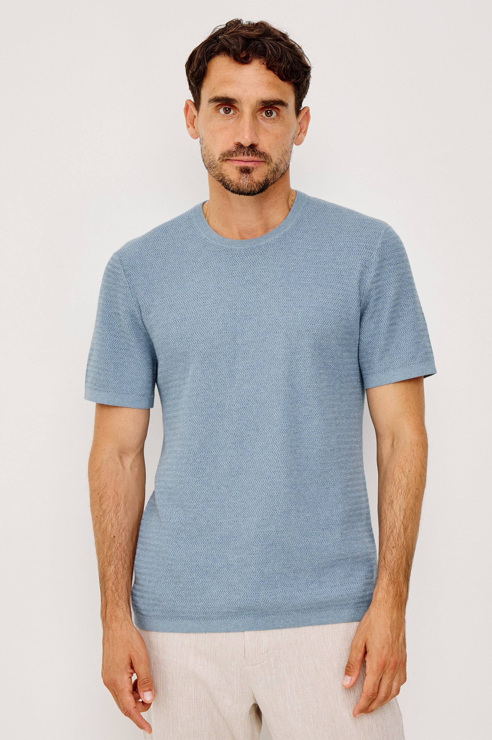 Theo T-Shirt in Ribbed Cotton-Cashmere With Crew Neckline, Short Sleeves, and Classic Fit in Blue Sky Heather Colorway - Upper Body Front View Featured on Model