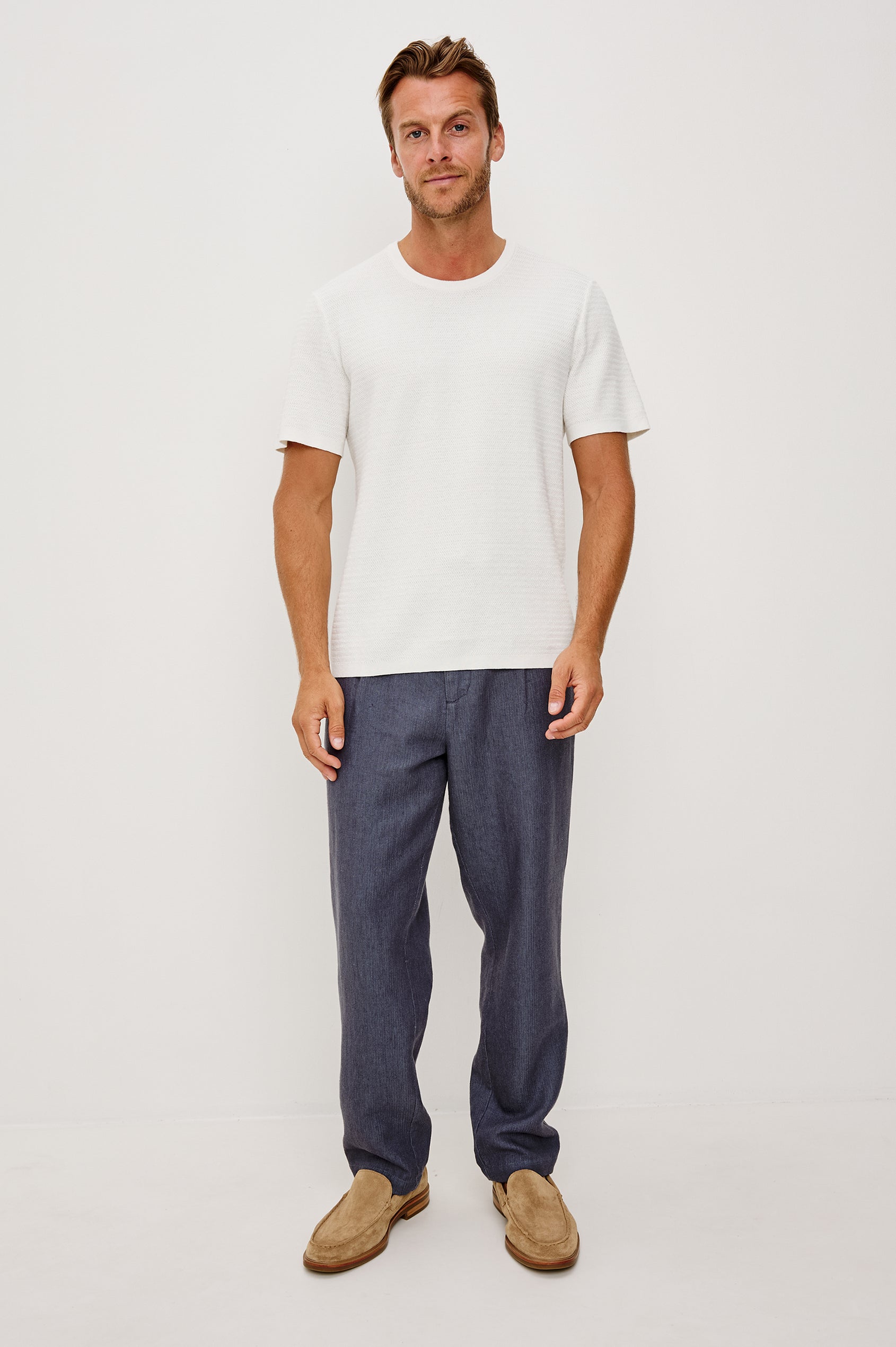 Theo T-Shirt in Ribbed Cotton-Cashmere With Crew Neckline, Short Sleeves, and Classic Fit in Porcelain Colorway - Full Body Front View Featured on Model