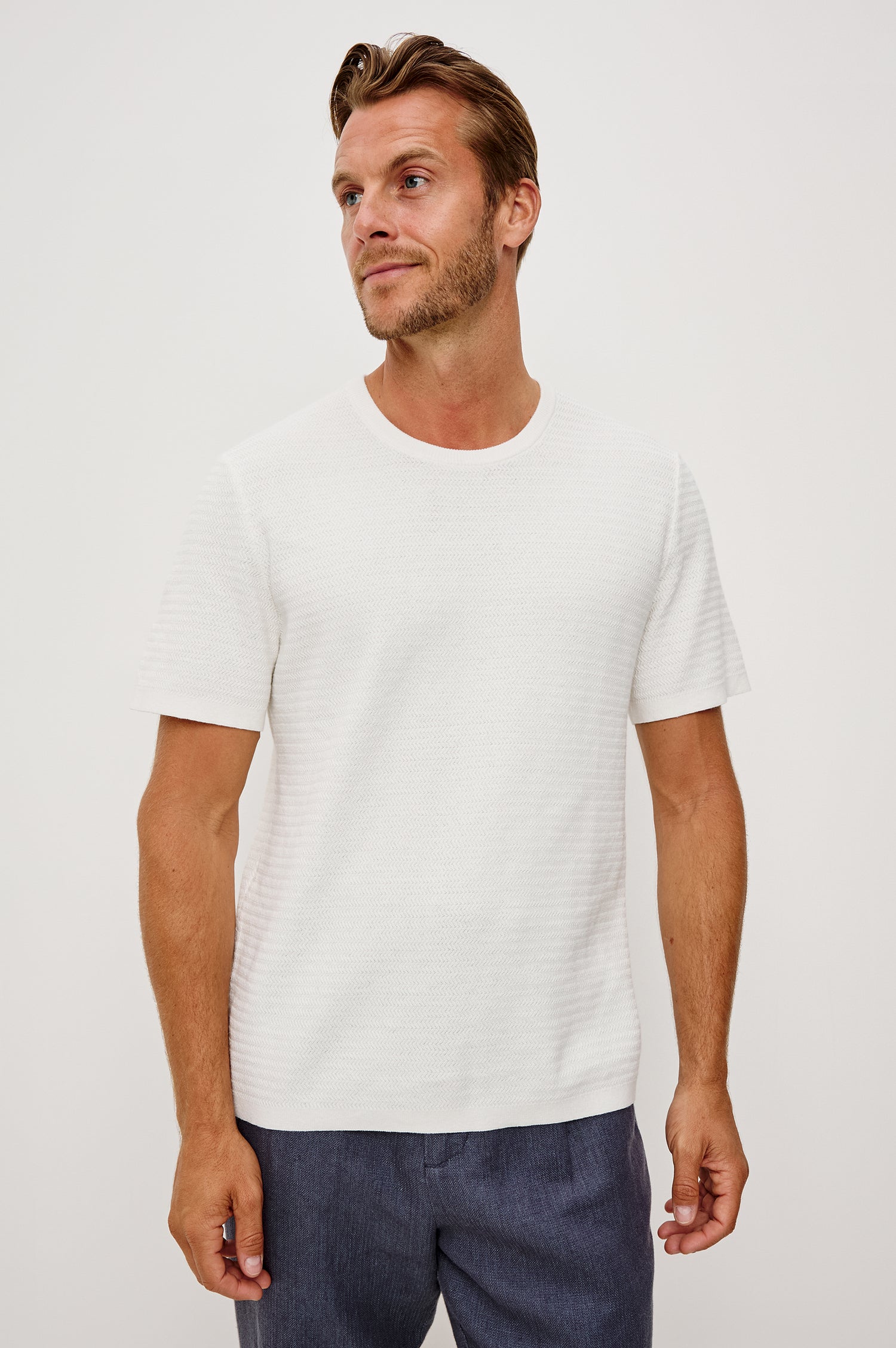 Theo T-Shirt in Ribbed Cotton-Cashmere With Crew Neckline, Short Sleeves, and Classic Fit in Porcelain Colorway - Upper Body Front View Featured on Model