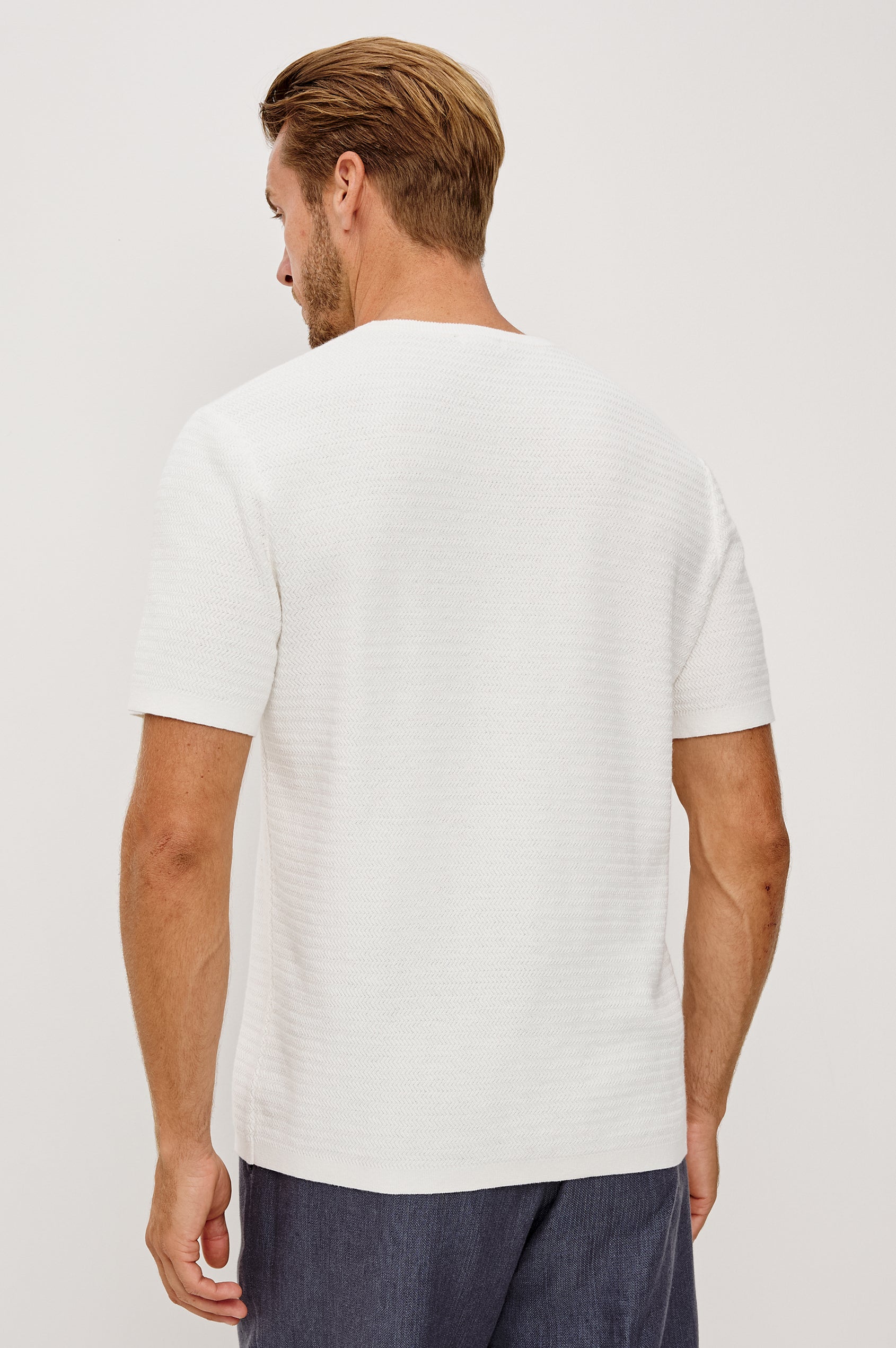 Theo T-Shirt in Ribbed Cotton-Cashmere With Crew Neckline, Short Sleeves, and Classic Fit in Porcelain Colorway - Upper Body Back View Featured on Model