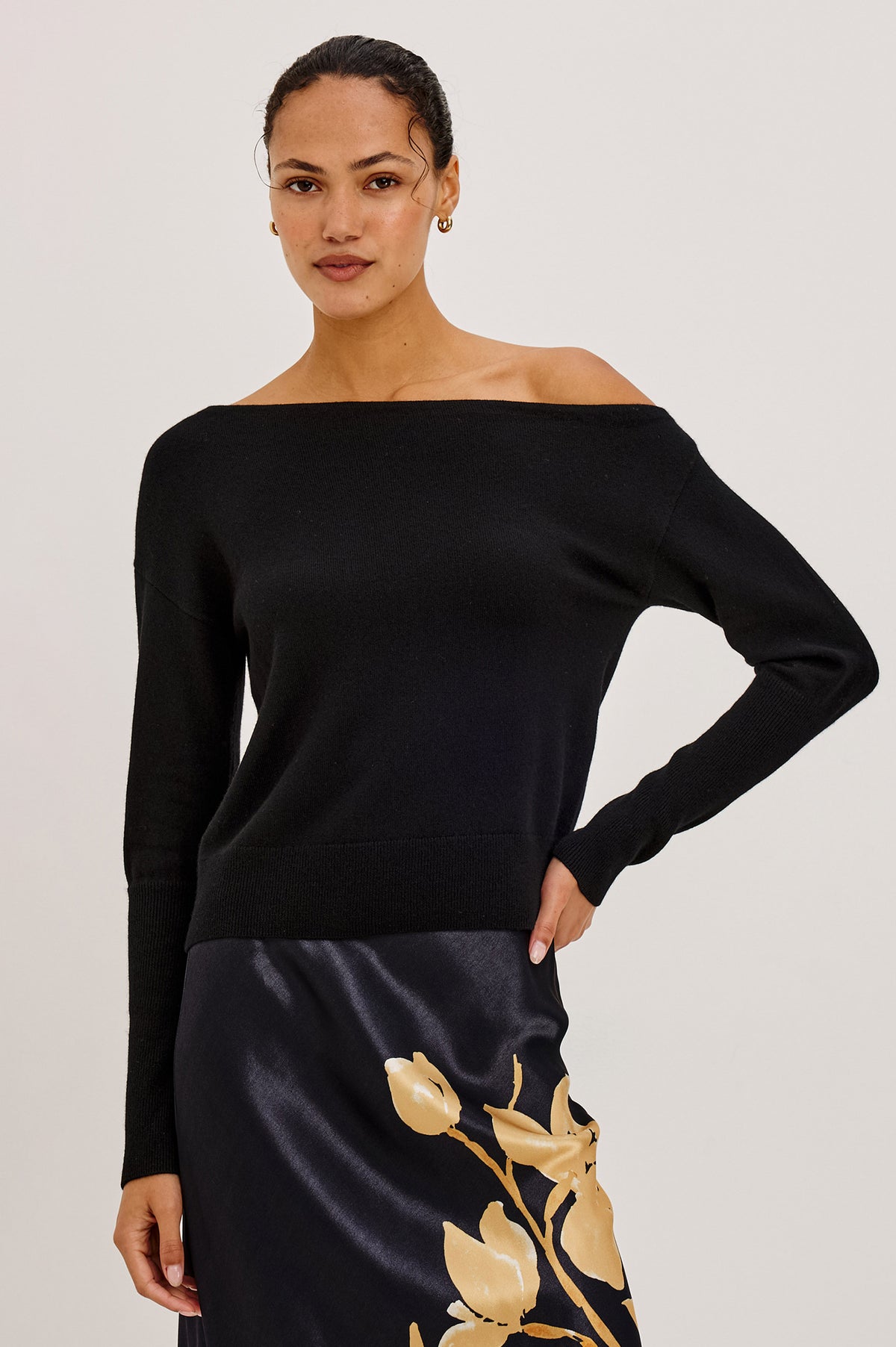 Tianna Sweater in Wool Blend With Off-Shoulder Neckline and Long Sleeves in Heather Charcoal Colorway - Upper Body Front View Featured on Model.